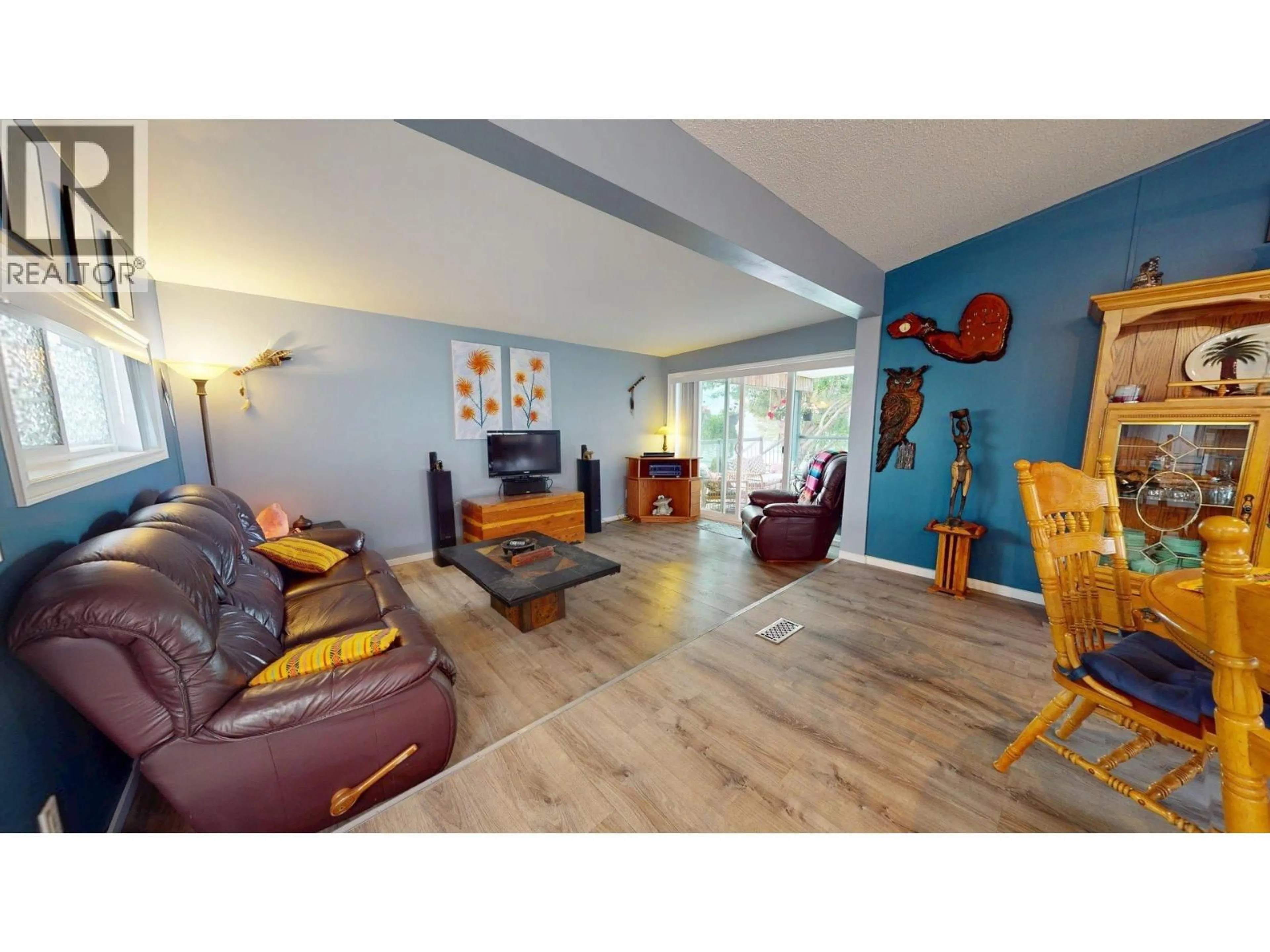 Living room with furniture, wood/laminate floor for 132 - 2035 BOUCHERIE ROAD, Westbank British Columbia V4T2T9