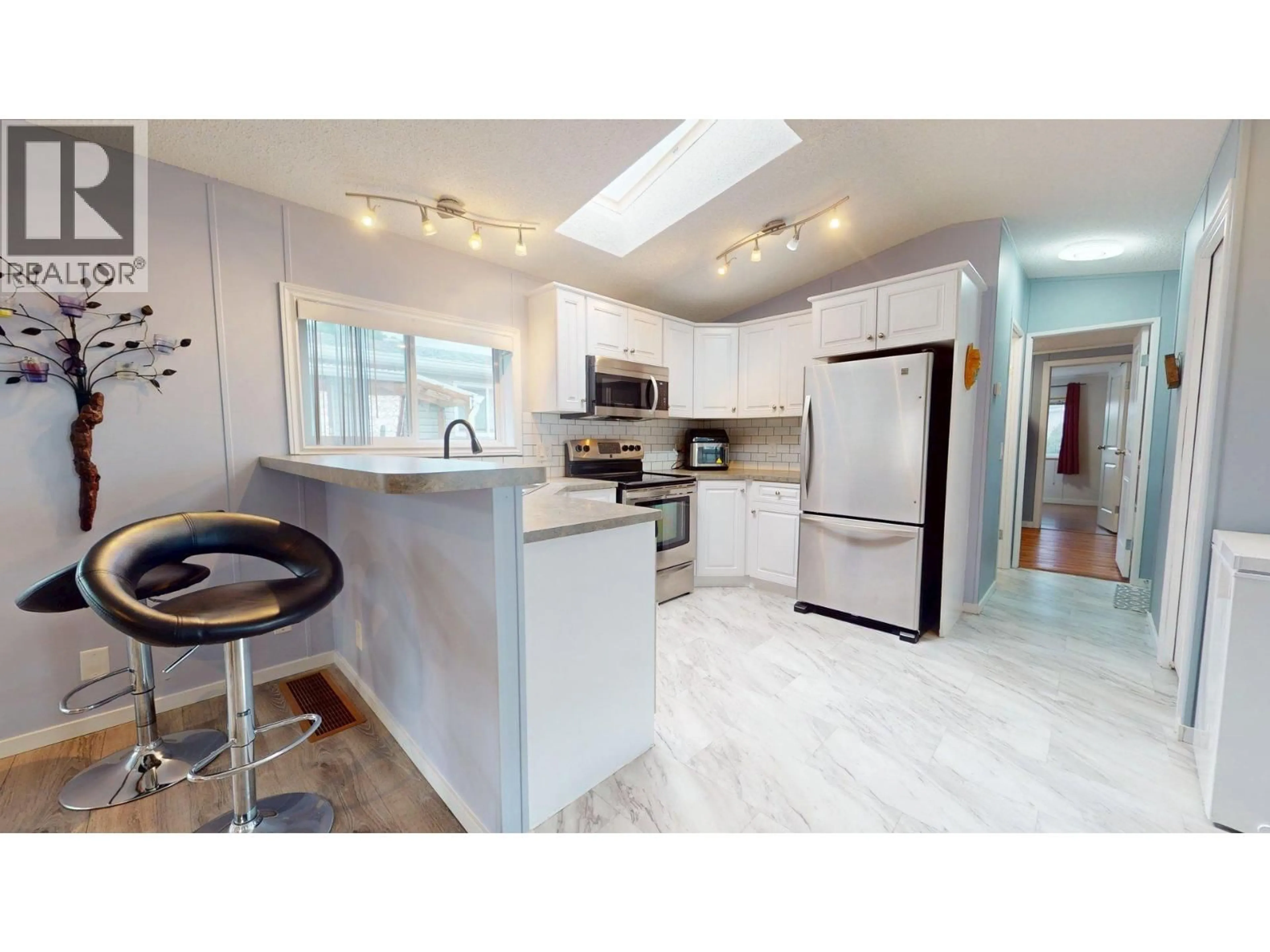 Open concept kitchen, ceramic/tile floor for 132 - 2035 BOUCHERIE ROAD, Westbank British Columbia V4T2T9
