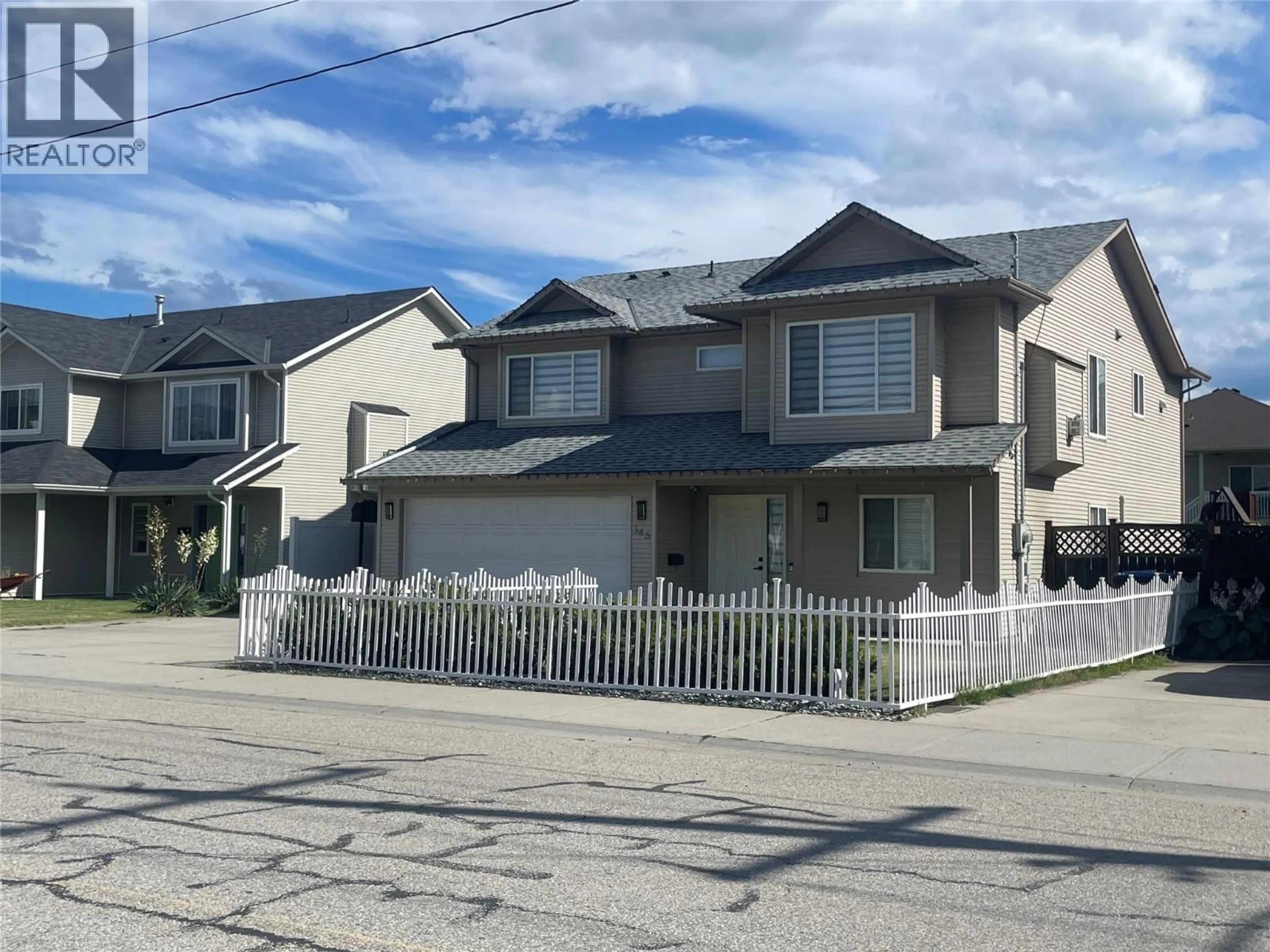 Home with vinyl exterior material, street for 345 FITZPATRICK ROAD, Kelowna British Columbia V1X5C8