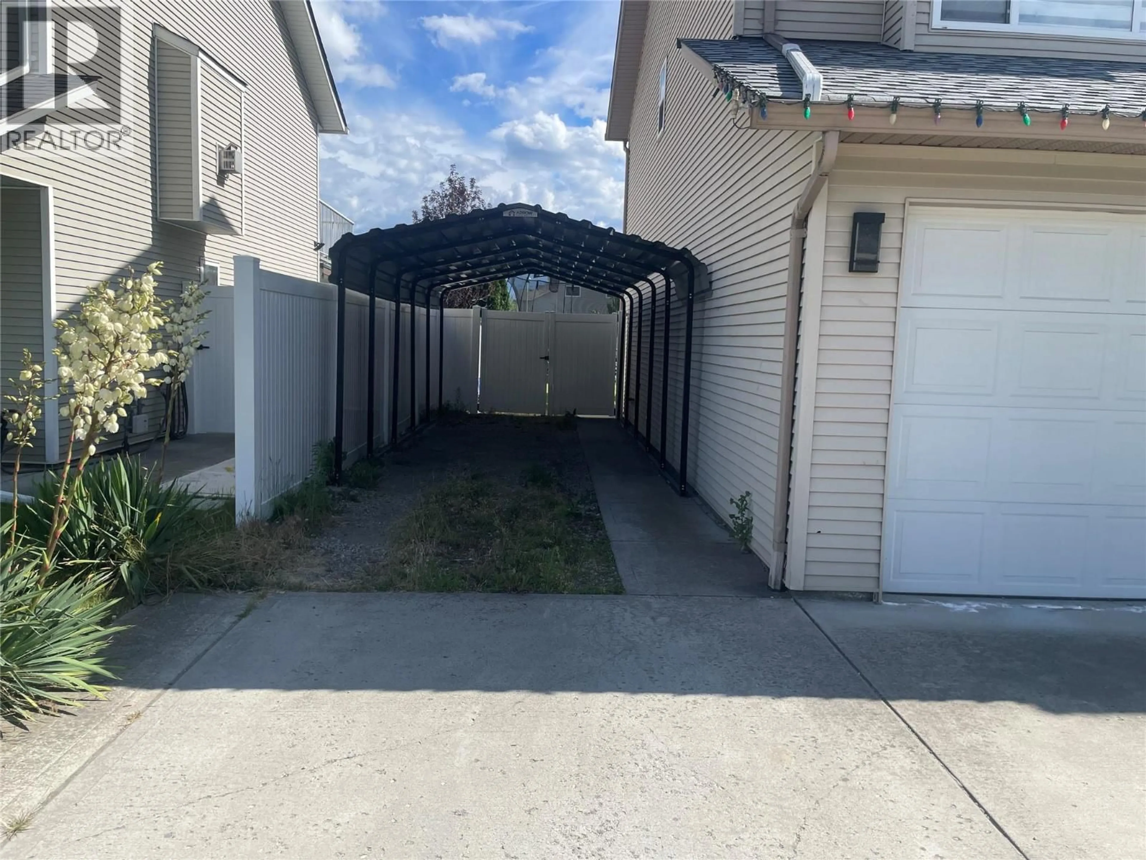 A pic from outside/outdoor area/front of a property/back of a property/a pic from drone, street for 345 FITZPATRICK ROAD, Kelowna British Columbia V1X5C8
