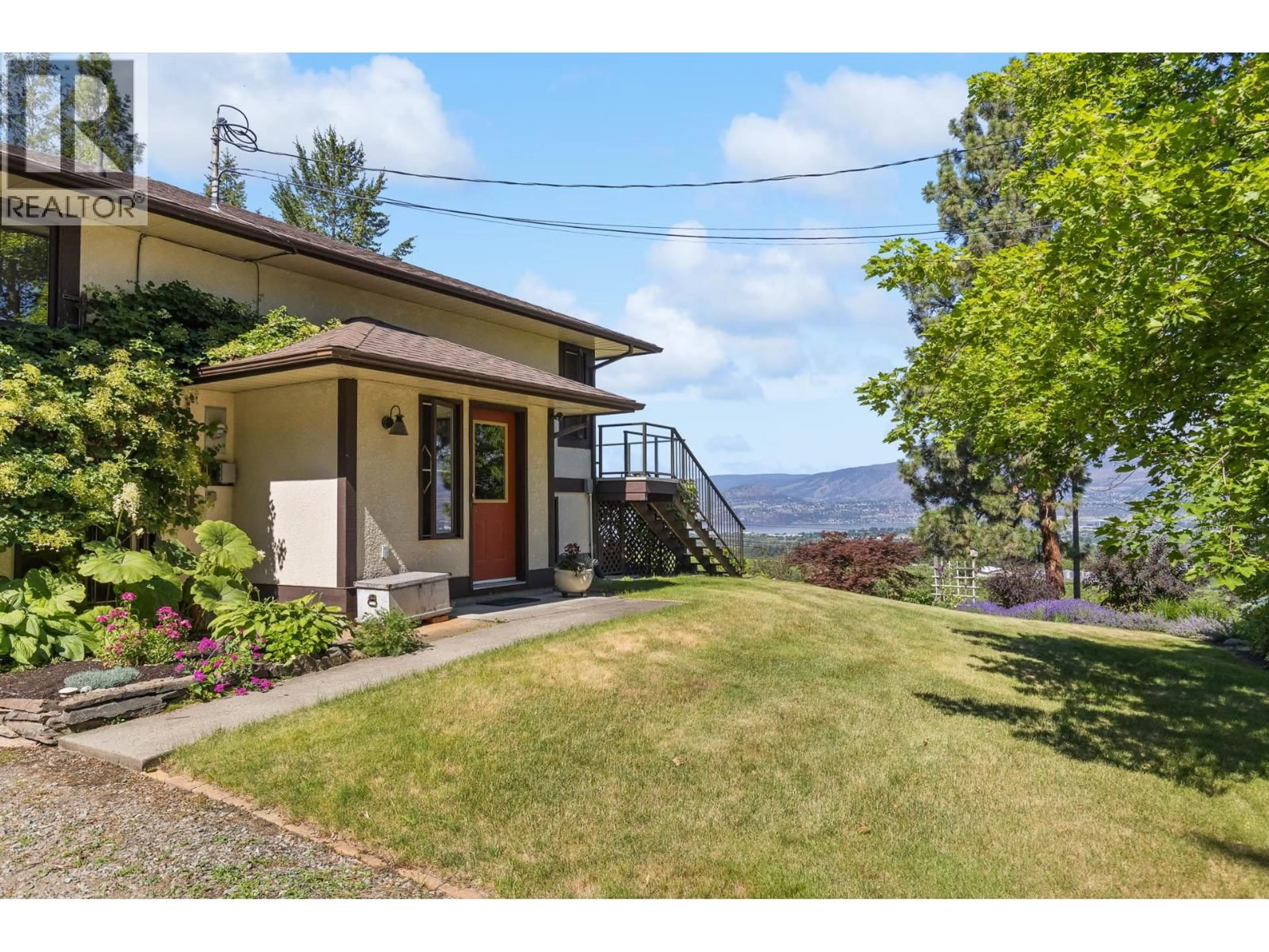 A pic from outside/outdoor area/front of a property/back of a property/a pic from drone, mountain view for 3885 SPIERS ROAD, Kelowna British Columbia V1W4B2