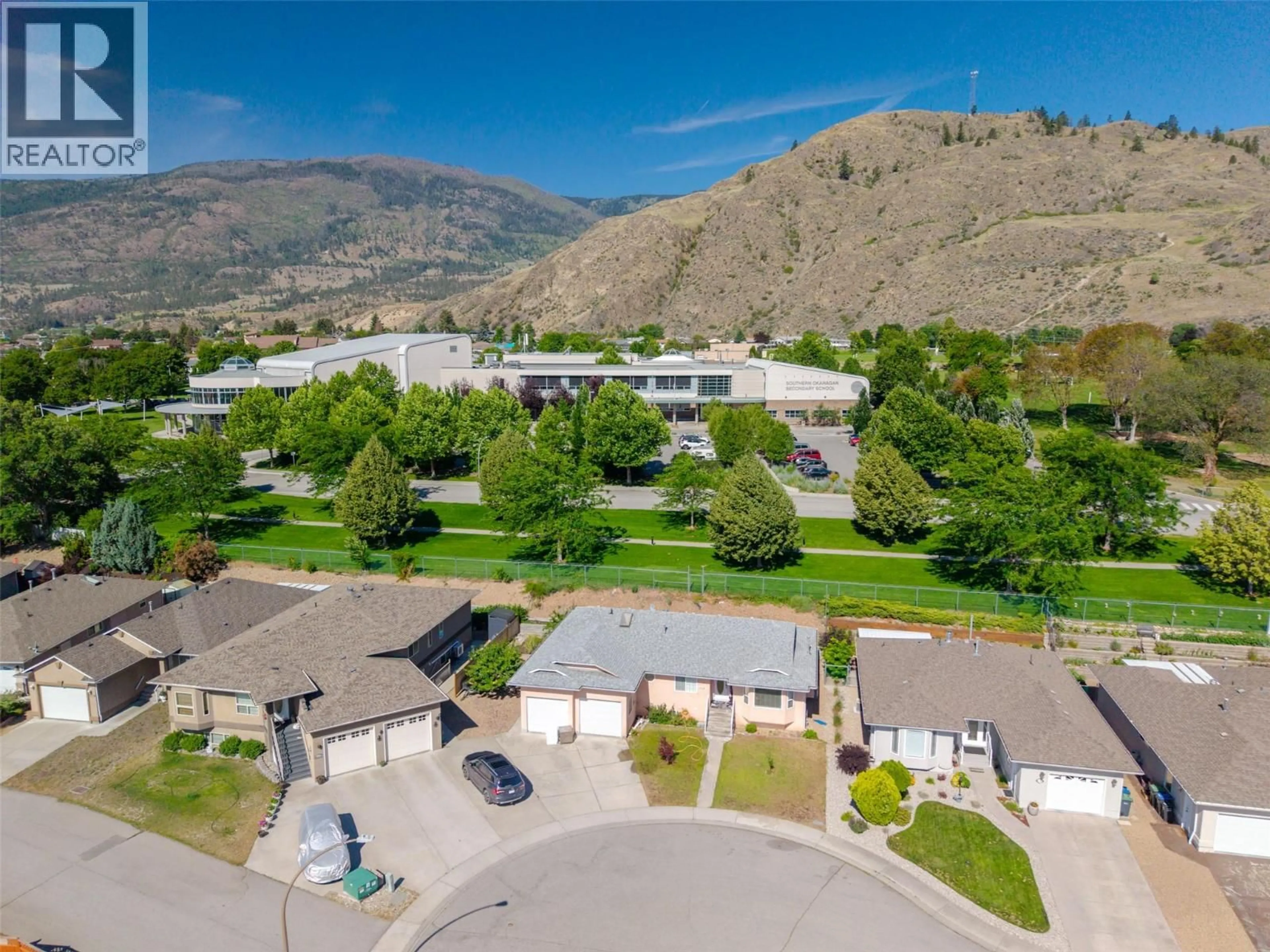 A pic from outside/outdoor area/front of a property/back of a property/a pic from drone, mountain view for 6128 SAINT MARTIN PLACE, Oliver British Columbia V0H1T0
