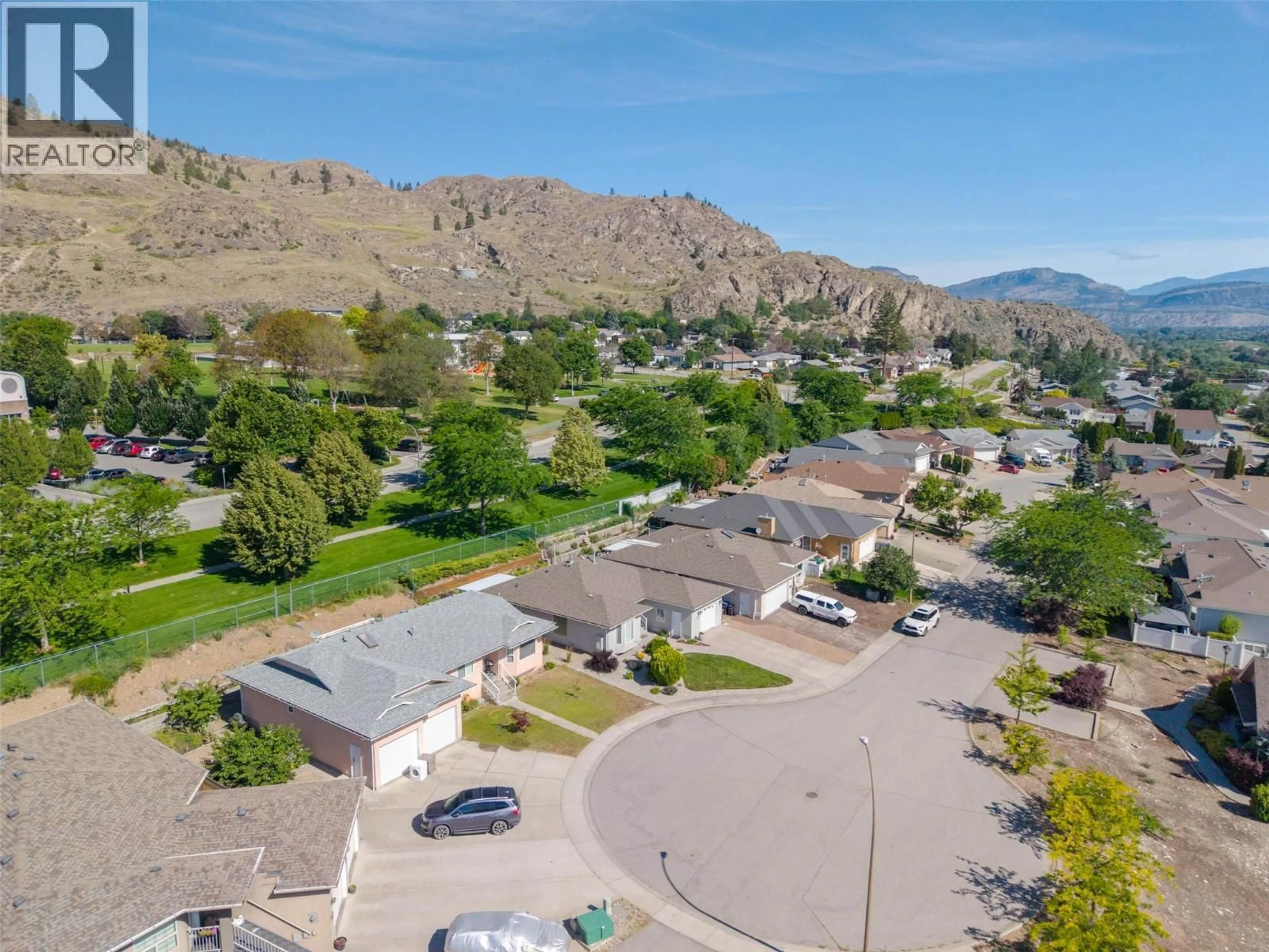 A pic from outside/outdoor area/front of a property/back of a property/a pic from drone, mountain view for 6128 SAINT MARTIN PLACE, Oliver British Columbia V0H1T0