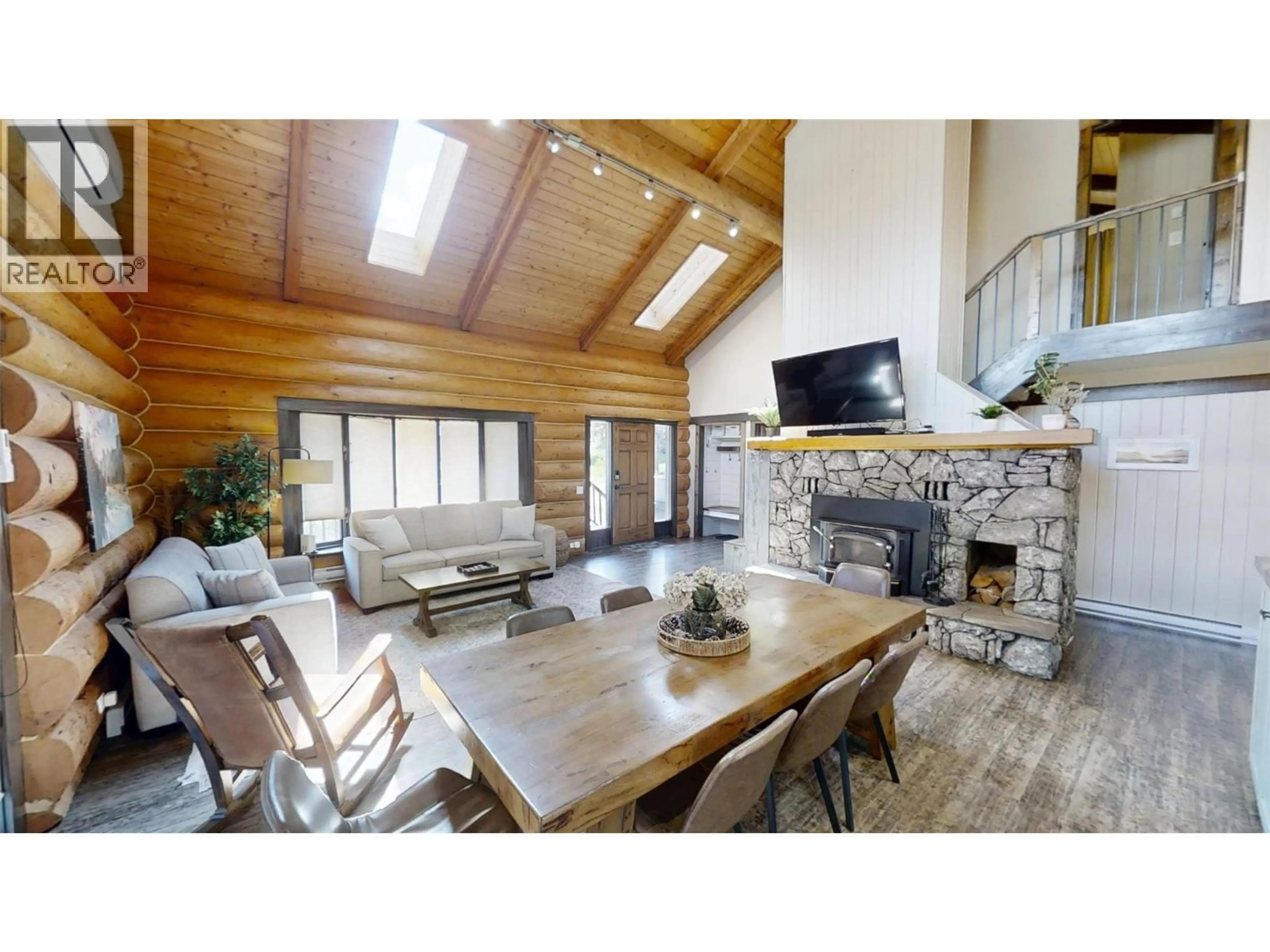 Living room with furniture, wood/laminate floor for 1600 14TH STREET, Invermere British Columbia V0A1K0