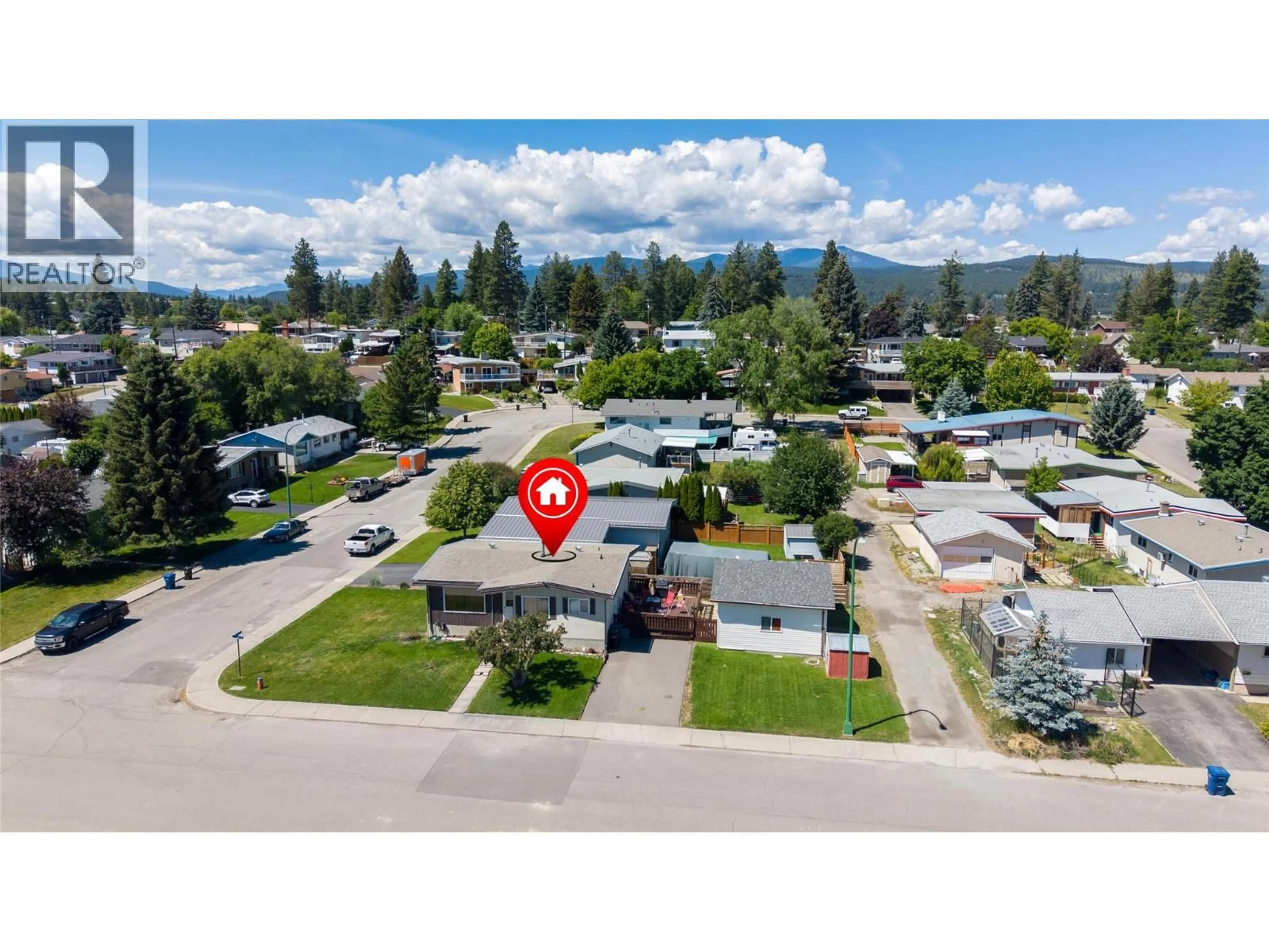 A pic from outside/outdoor area/front of a property/back of a property/a pic from drone, mountain view for 1516 6A STREET SOUTH, Cranbrook British Columbia V1C4J1