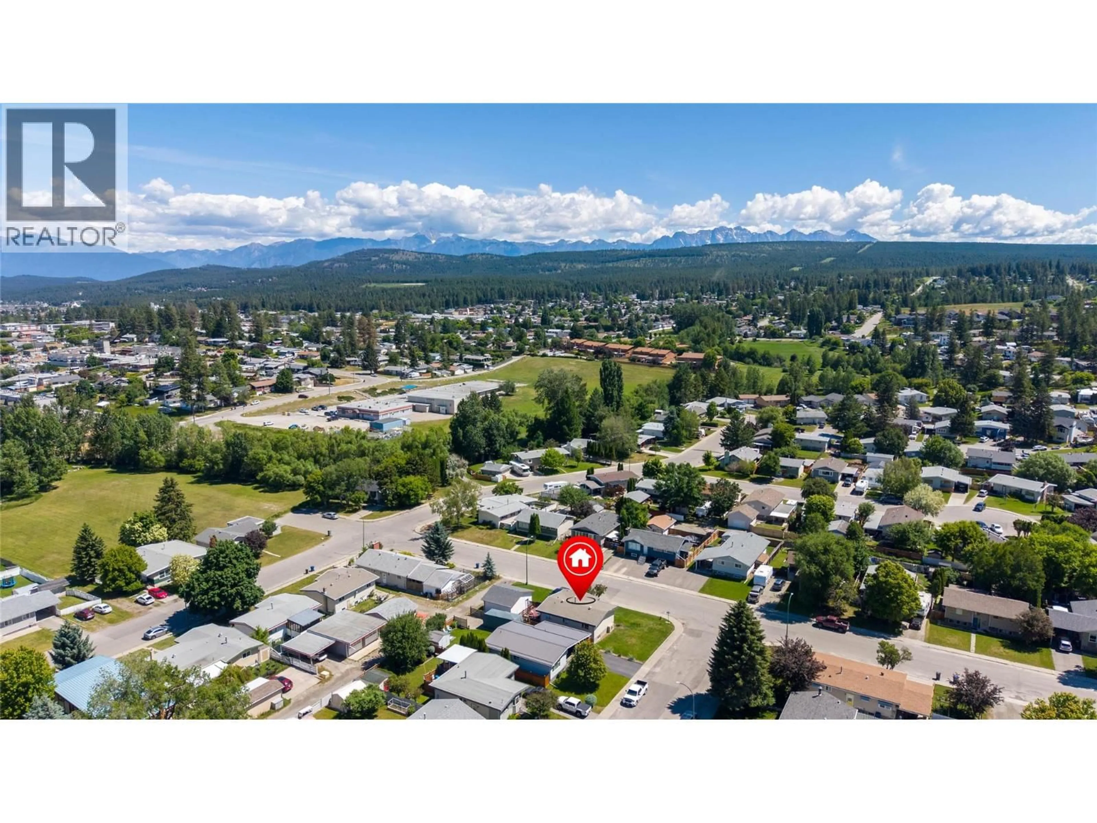 A pic from outside/outdoor area/front of a property/back of a property/a pic from drone, mountain view for 1516 6A STREET SOUTH, Cranbrook British Columbia V1C4J1
