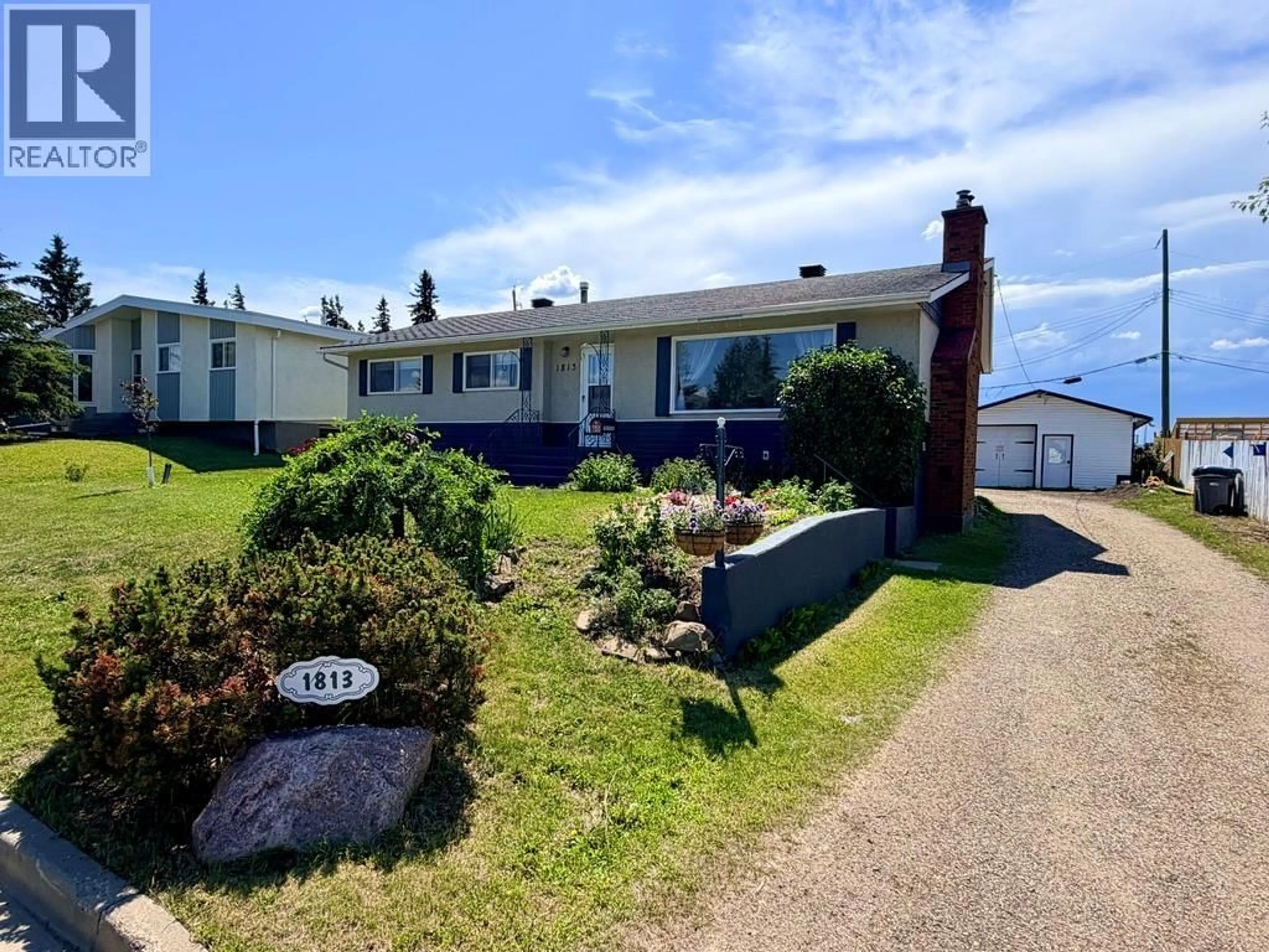 A pic from outside/outdoor area/front of a property/back of a property/a pic from drone, street for 1813 110 AVENUE, Dawson Creek British Columbia V1G0A3