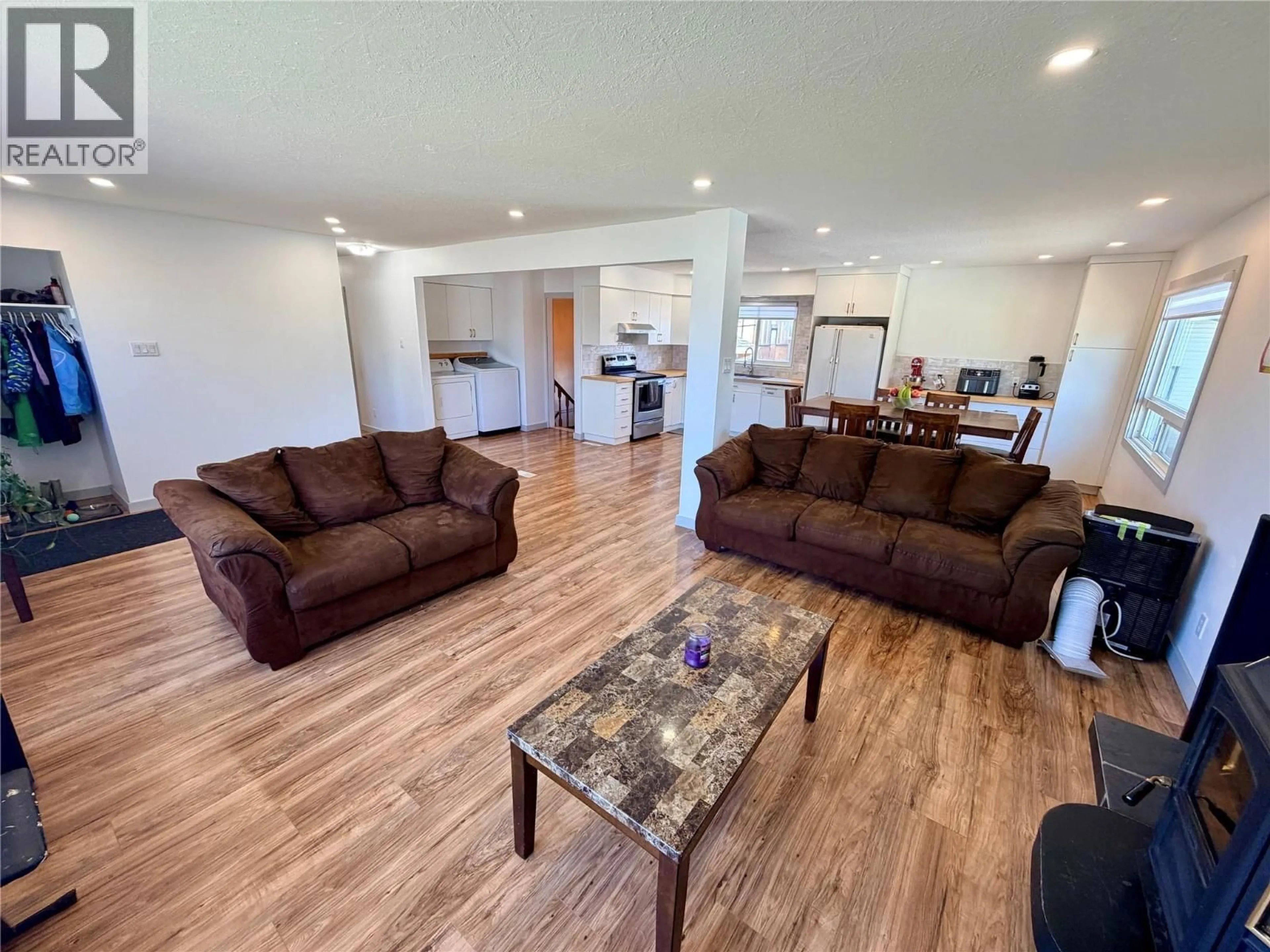 Living room with furniture, unknown for 1813 110 AVENUE, Dawson Creek British Columbia V1G0A3