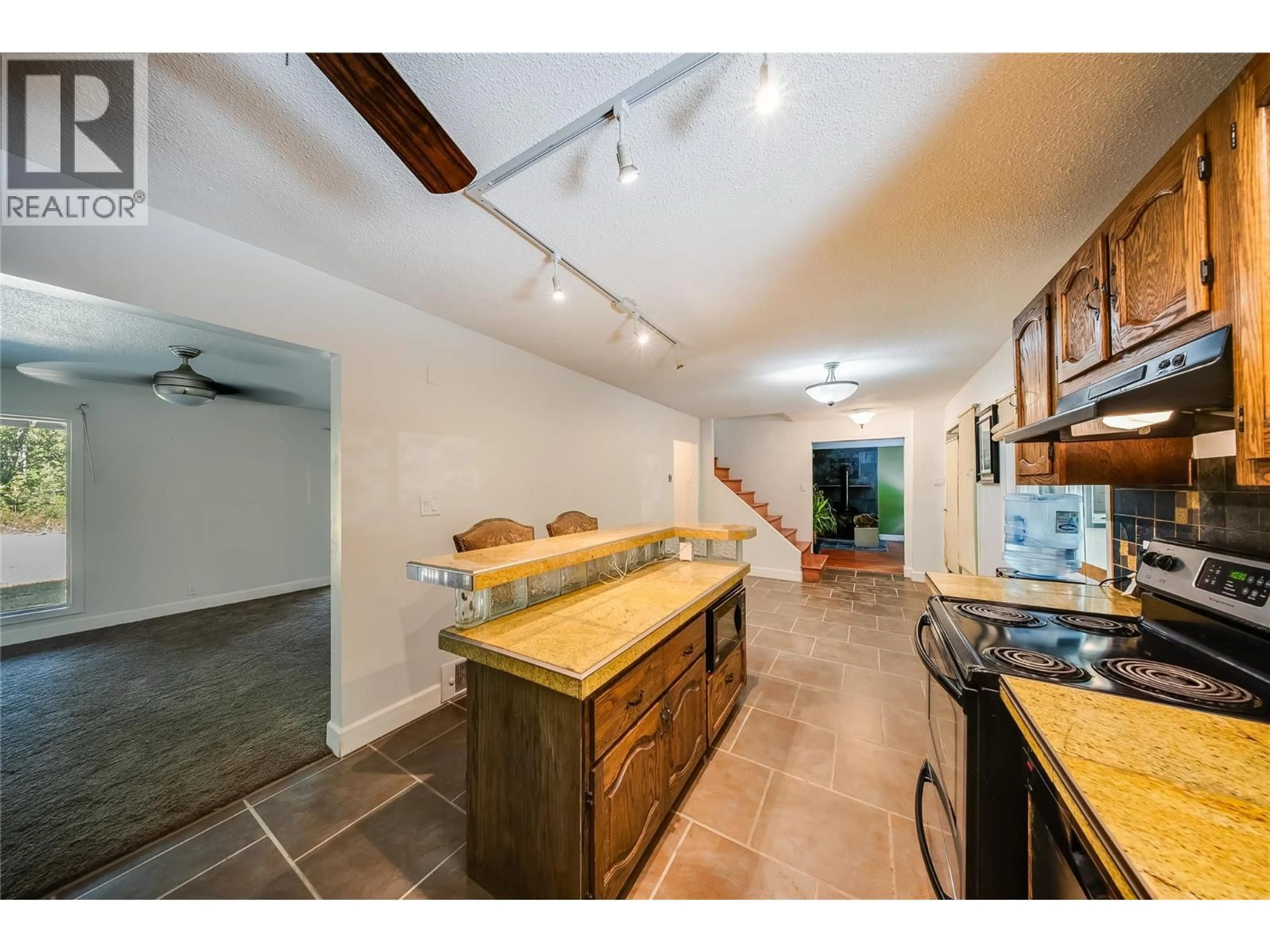 Open concept kitchen, ceramic/tile floor for 60 SHORT STREET, Trail British Columbia V1R2L3