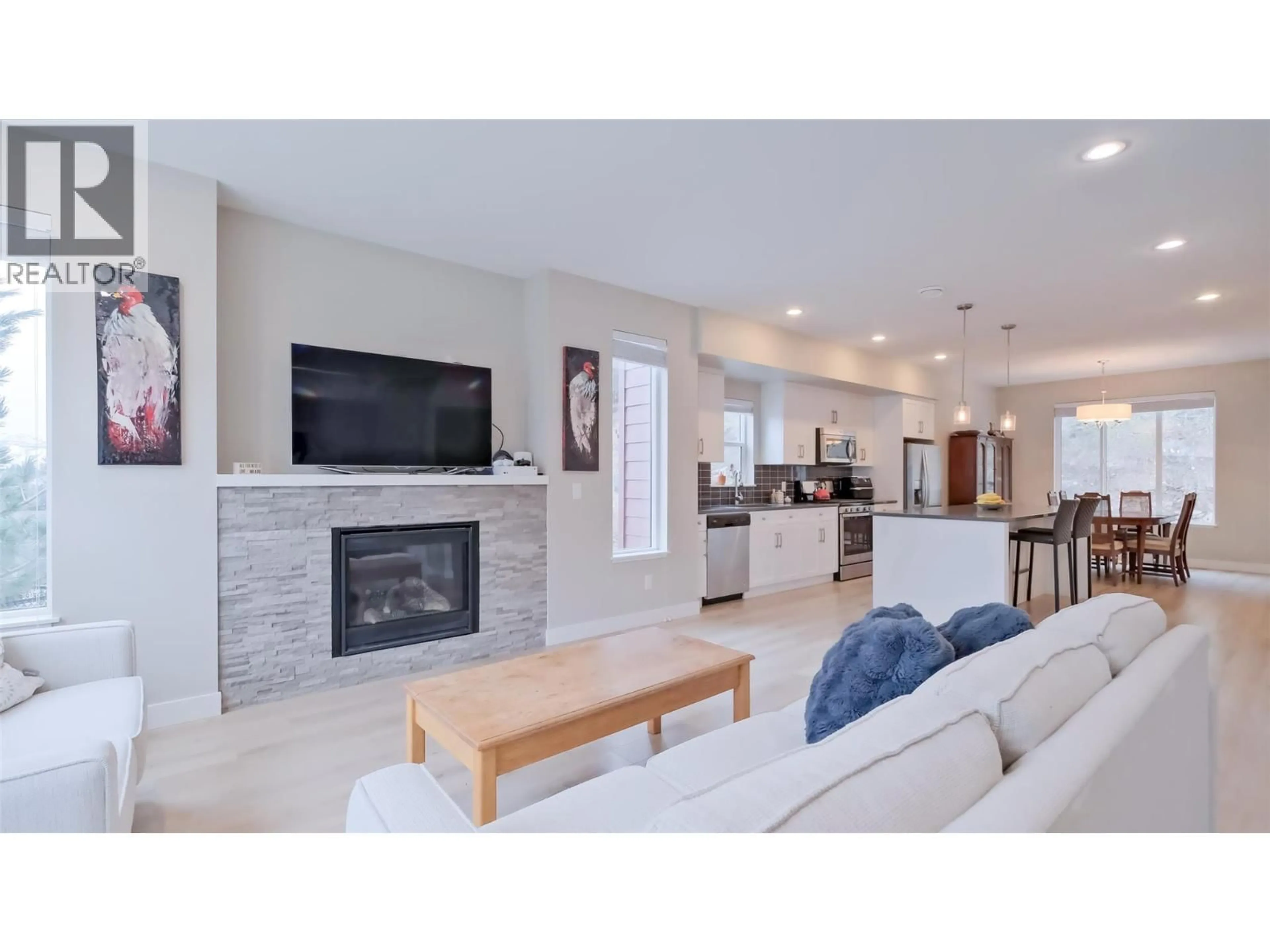 Living room with furniture, ceramic/tile floor for 82 - 2490 TUSCANY DRIVE, West Kelowna British Columbia V4T3M4