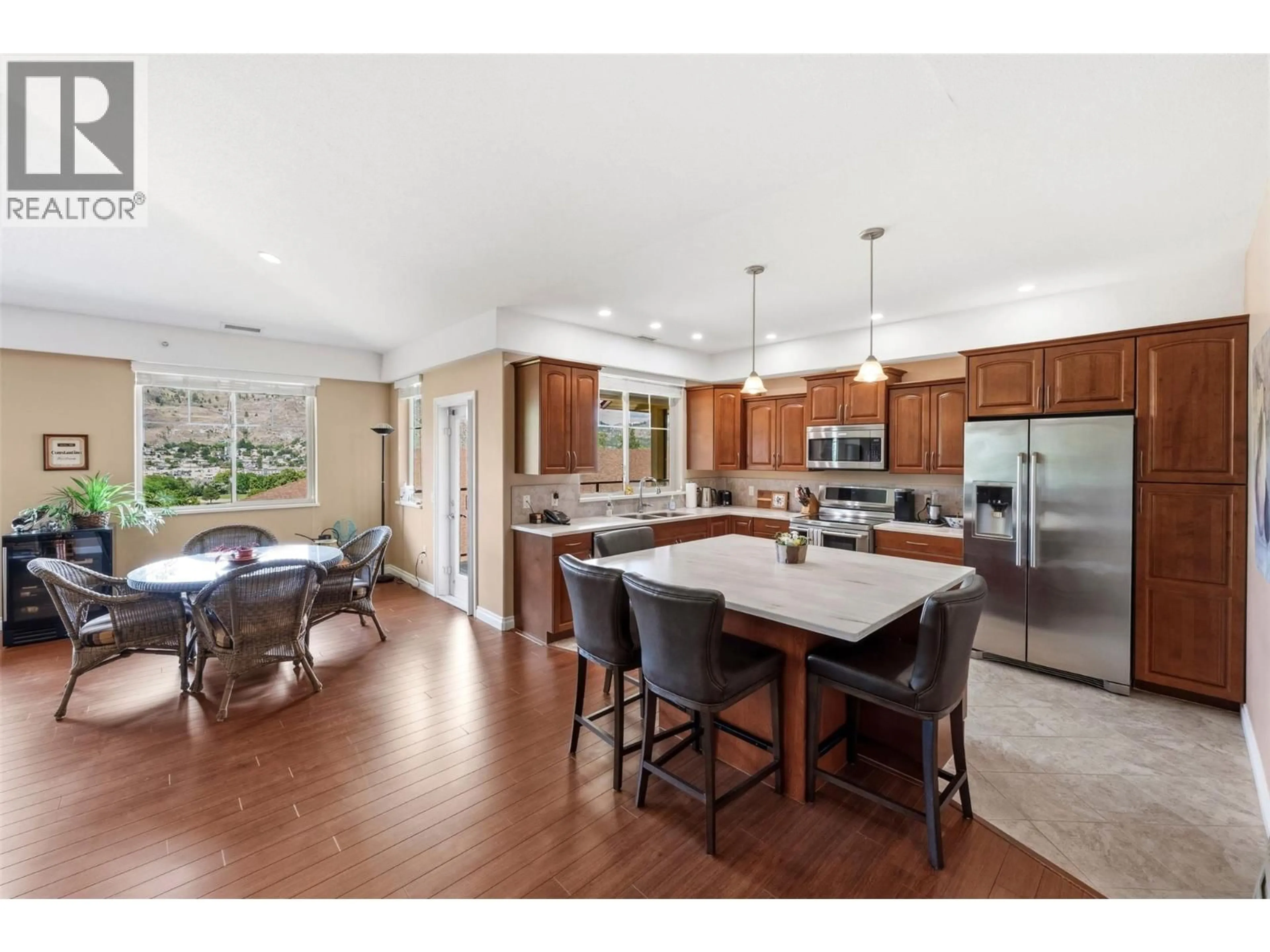 Open concept kitchen, ceramic/tile floor for 405B - 921 SPILLWAY ROAD, Oliver British Columbia V0H1T2