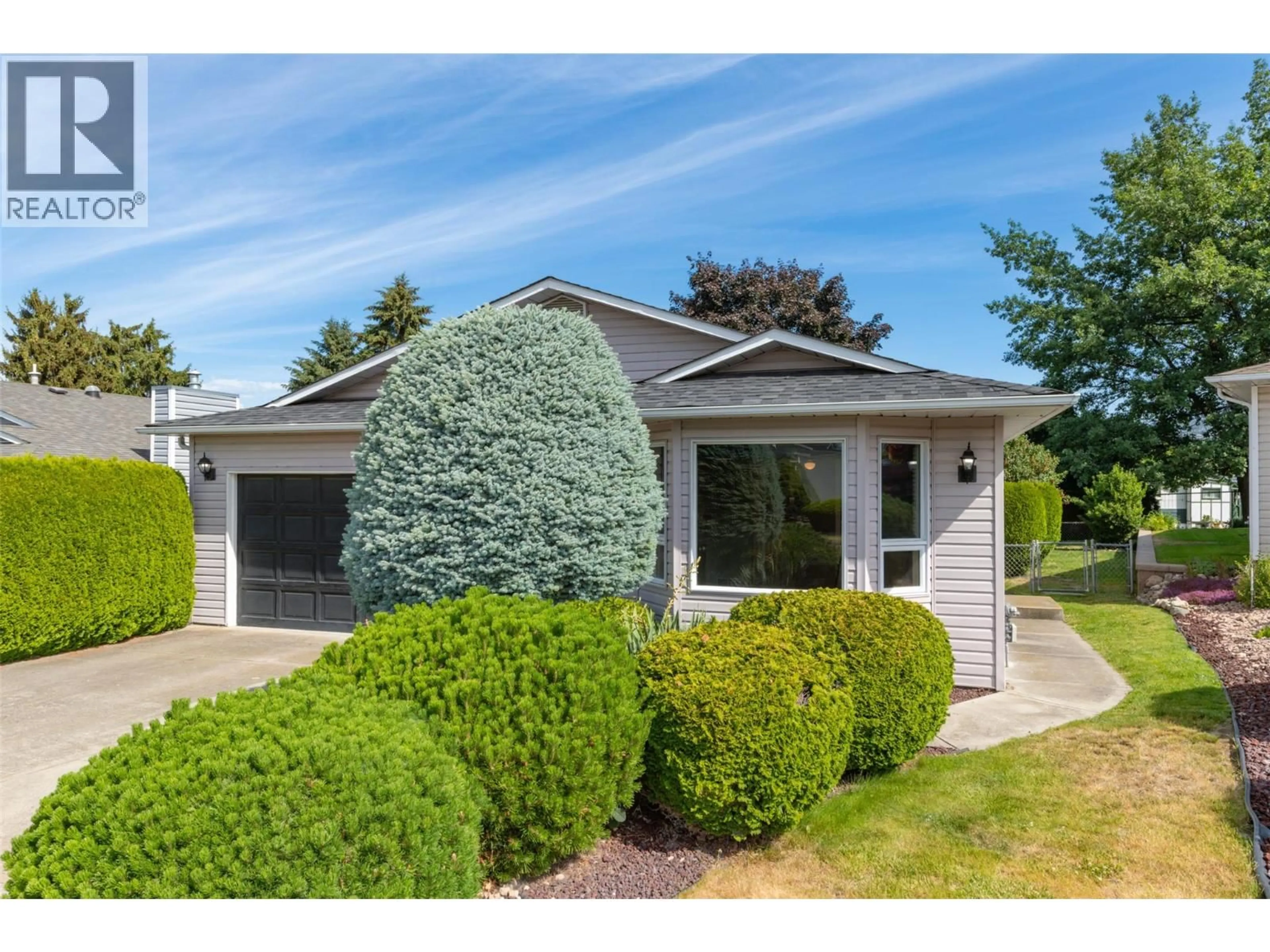 Home with vinyl exterior material, street for 18 - 3481 OLD VERNON ROAD, Kelowna British Columbia V1X6Z6