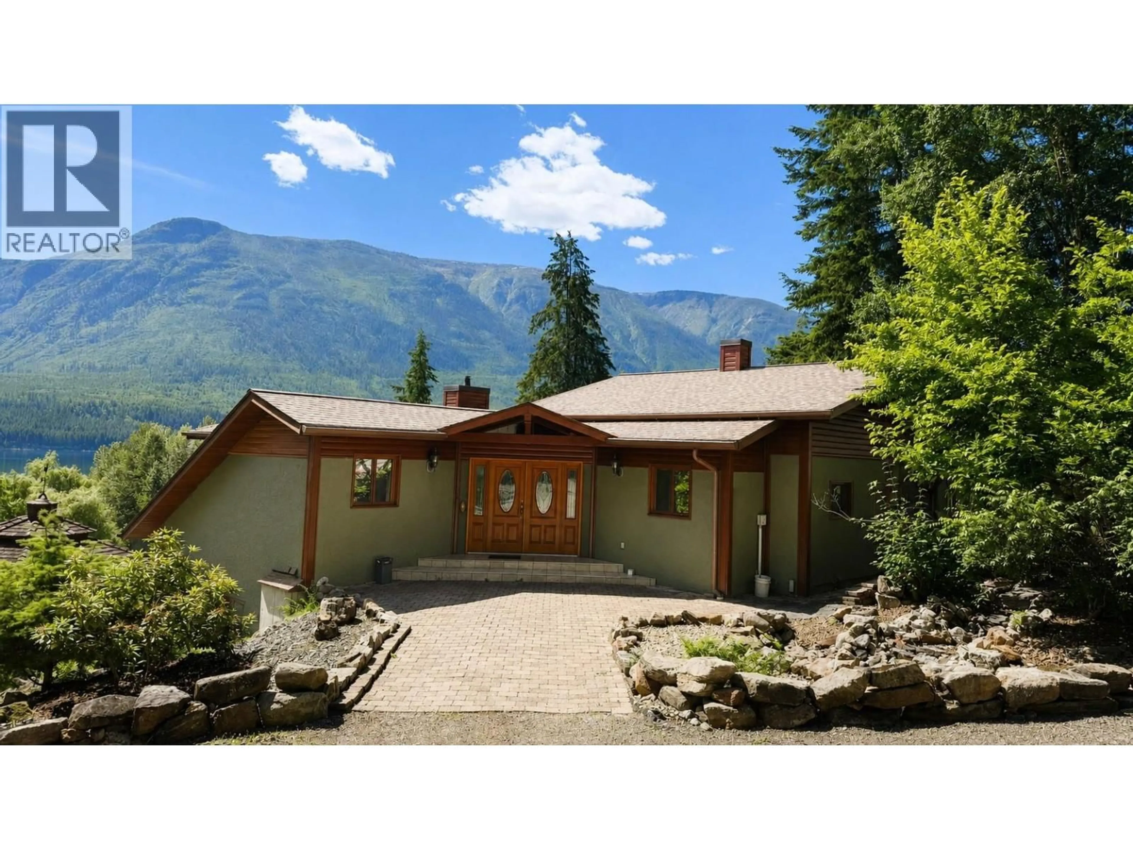 A pic from outside/outdoor area/front of a property/back of a property/a pic from drone, mountain view for 5392 HWY 6 HIGHWAY, Burton British Columbia V0G1R0