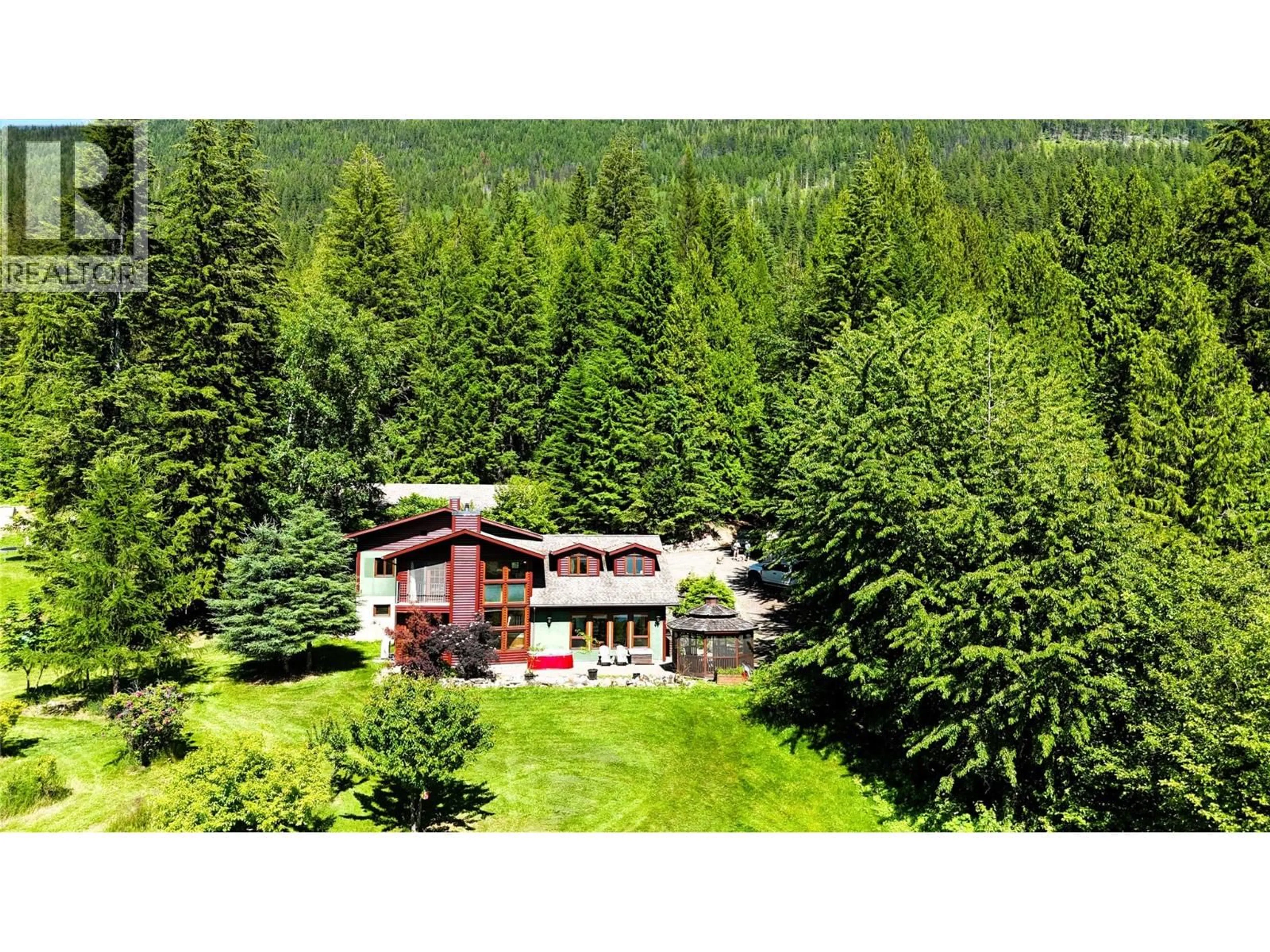 A pic from outside/outdoor area/front of a property/back of a property/a pic from drone, forest/trees view for 5392 HWY 6 HIGHWAY, Burton British Columbia V0G1R0