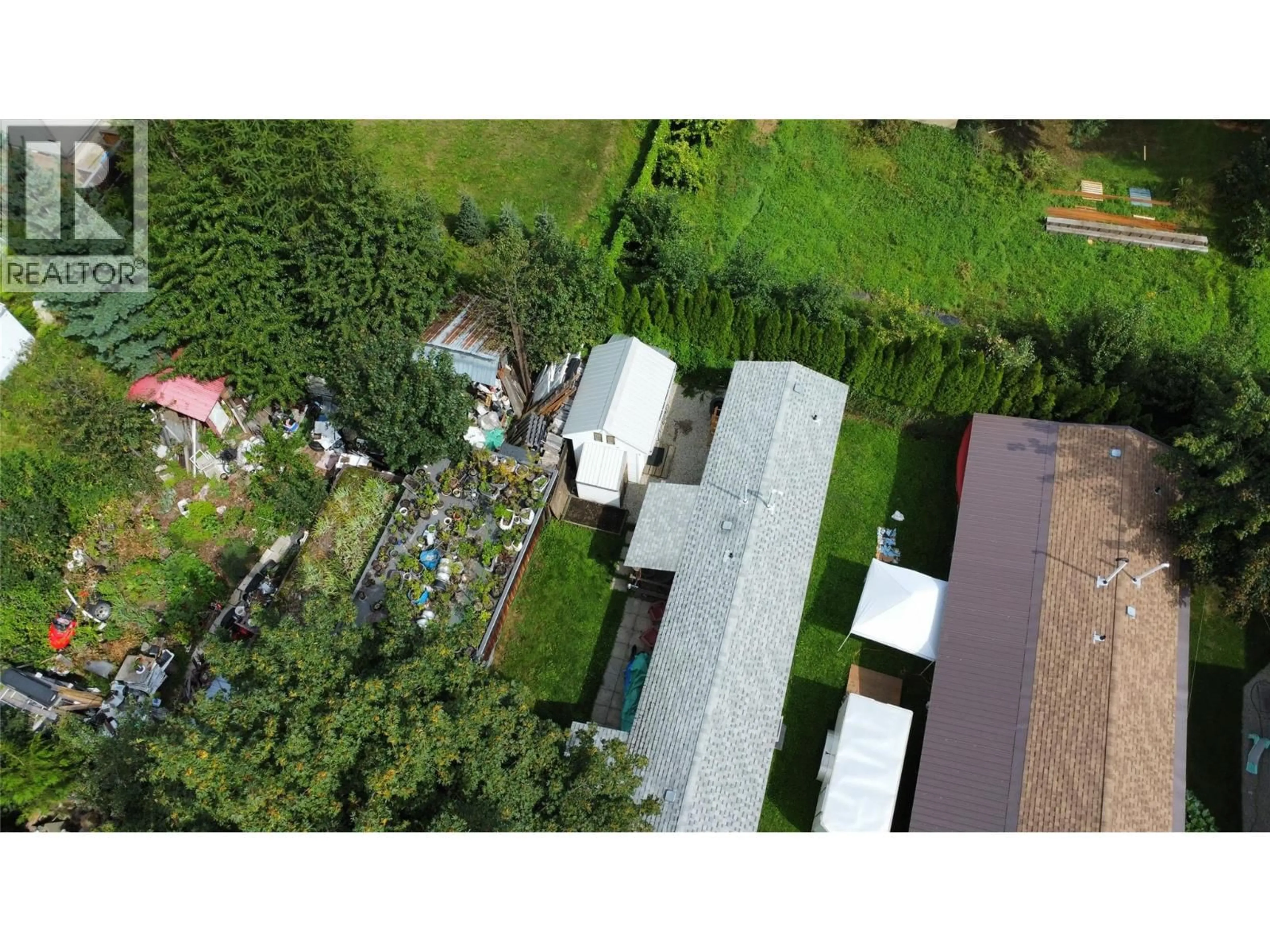 A pic from outside/outdoor area/front of a property/back of a property/a pic from drone, building for 10 - 318 HUMBERT STREET, Revelstoke British Columbia V0E2S0