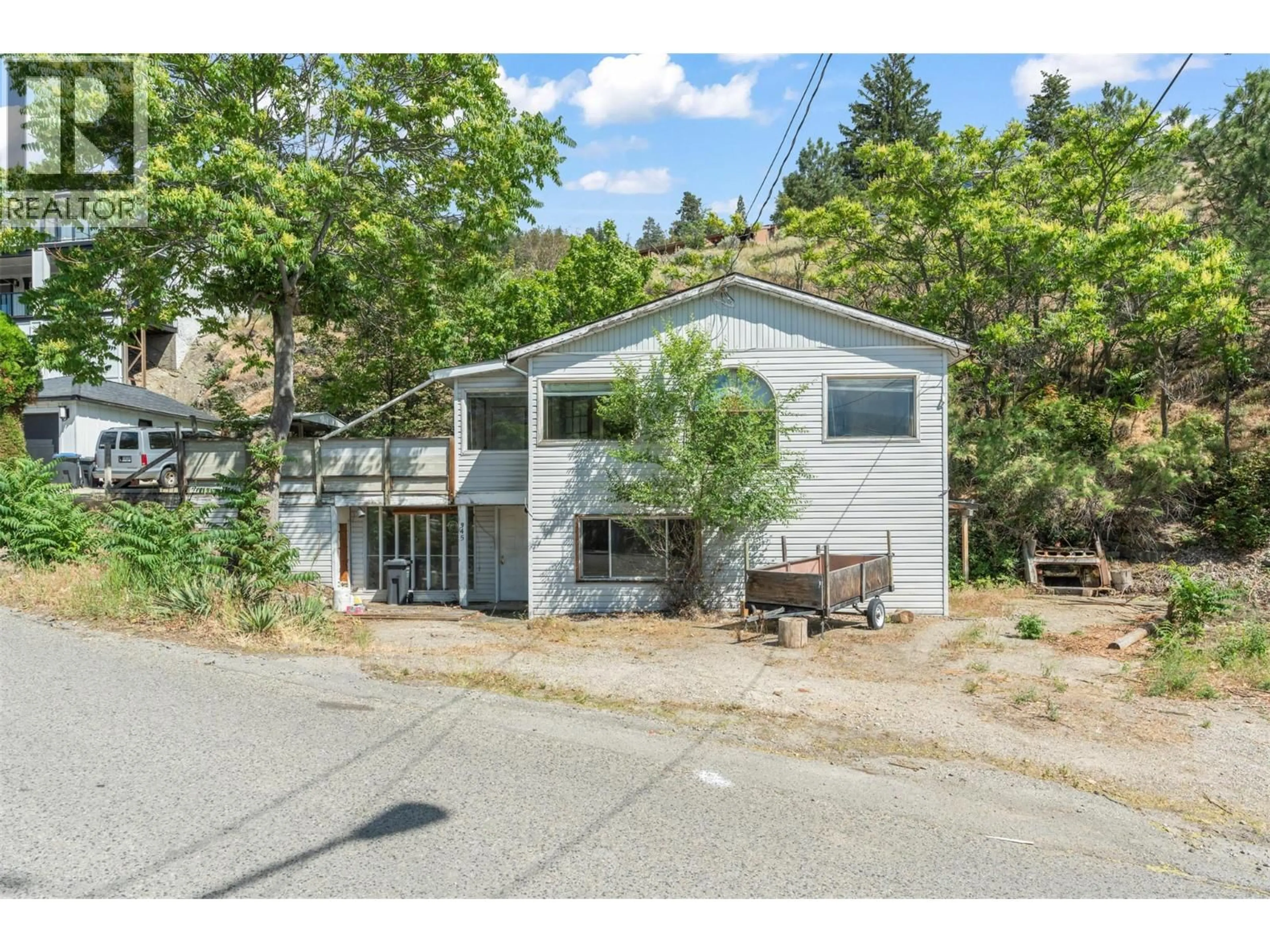 Home with vinyl exterior material, street for 345 POPLAR POINT DRIVE, Kelowna British Columbia V1Y1Y2