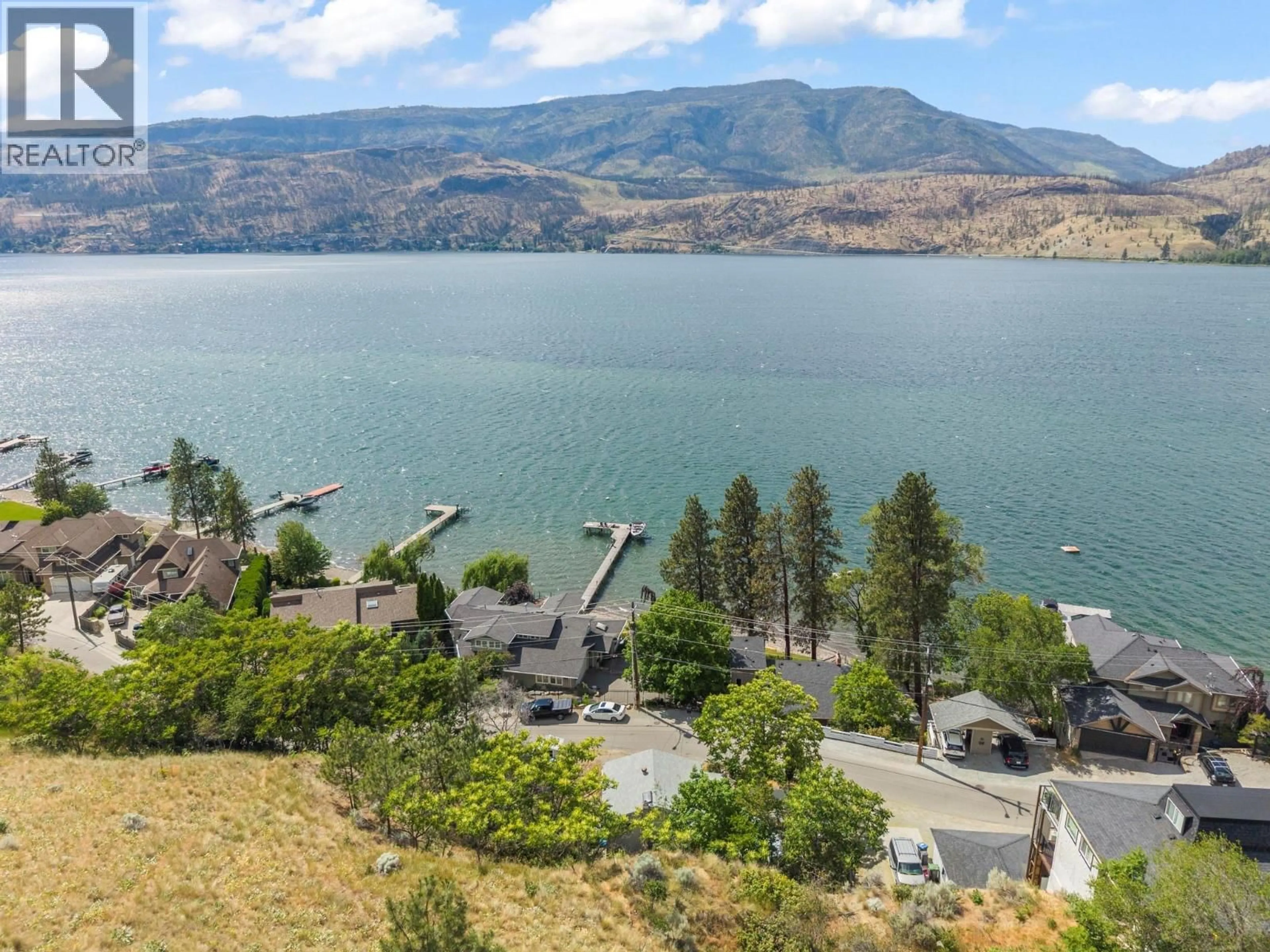 A pic from outside/outdoor area/front of a property/back of a property/a pic from drone, water/lake/river/ocean view for 345 POPLAR POINT DRIVE, Kelowna British Columbia V1Y1Y2