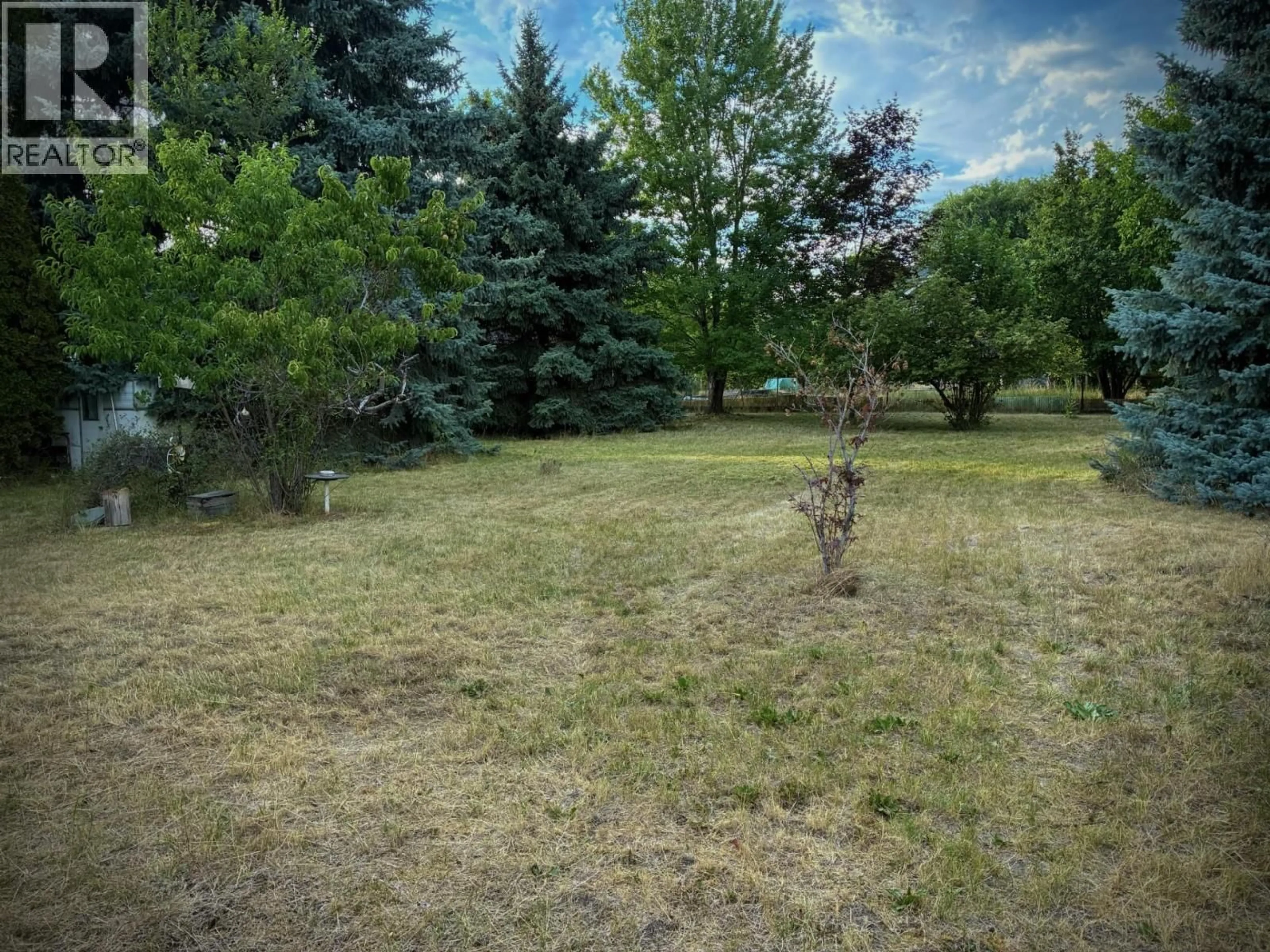 A pic from outside/outdoor area/front of a property/back of a property/a pic from drone, forest/trees view for 1220 K.L.O ROAD, Kelowna British Columbia V1W3P9
