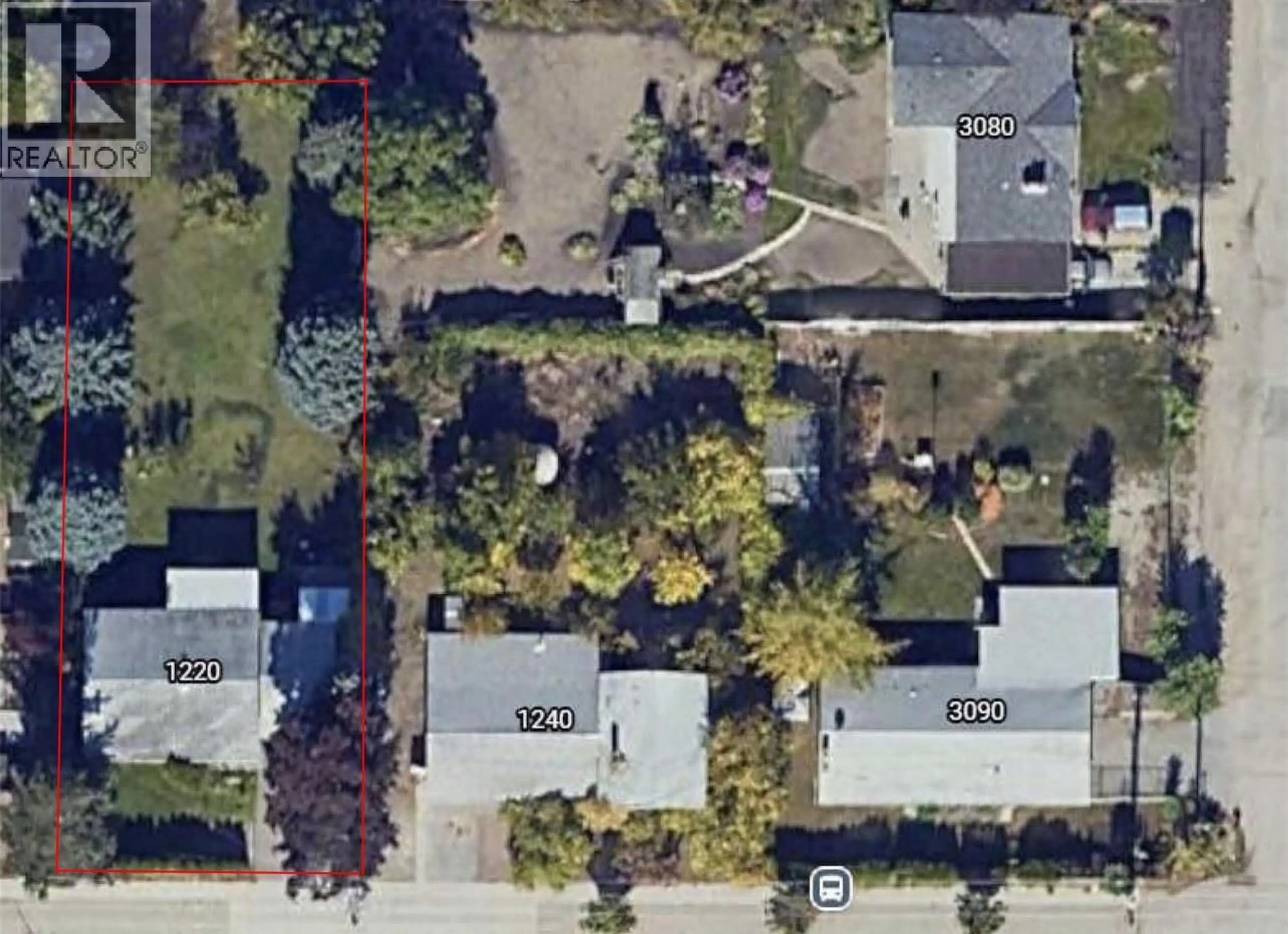 A pic from outside/outdoor area/front of a property/back of a property/a pic from drone, street for 1220 K.L.O ROAD, Kelowna British Columbia V1W3P9