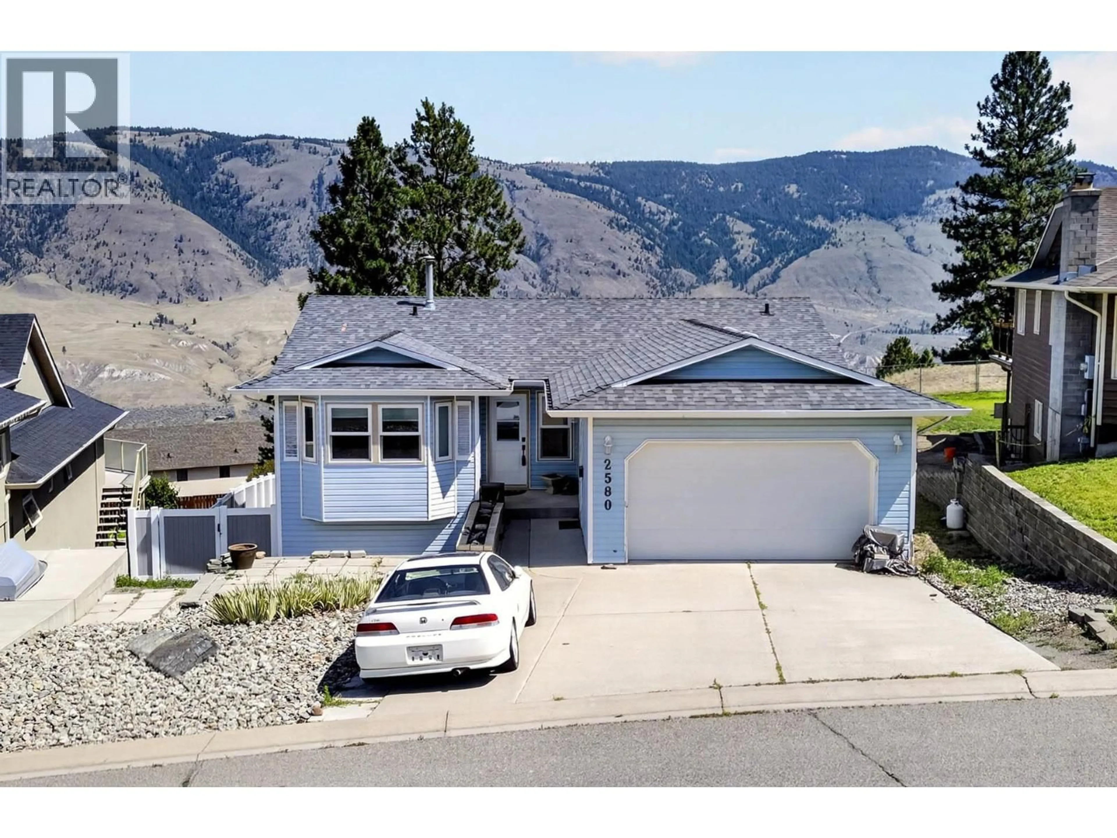 A pic from outside/outdoor area/front of a property/back of a property/a pic from drone, mountain view for 2580 NECHAKO DRIVE, Kamloops British Columbia V2E2C9