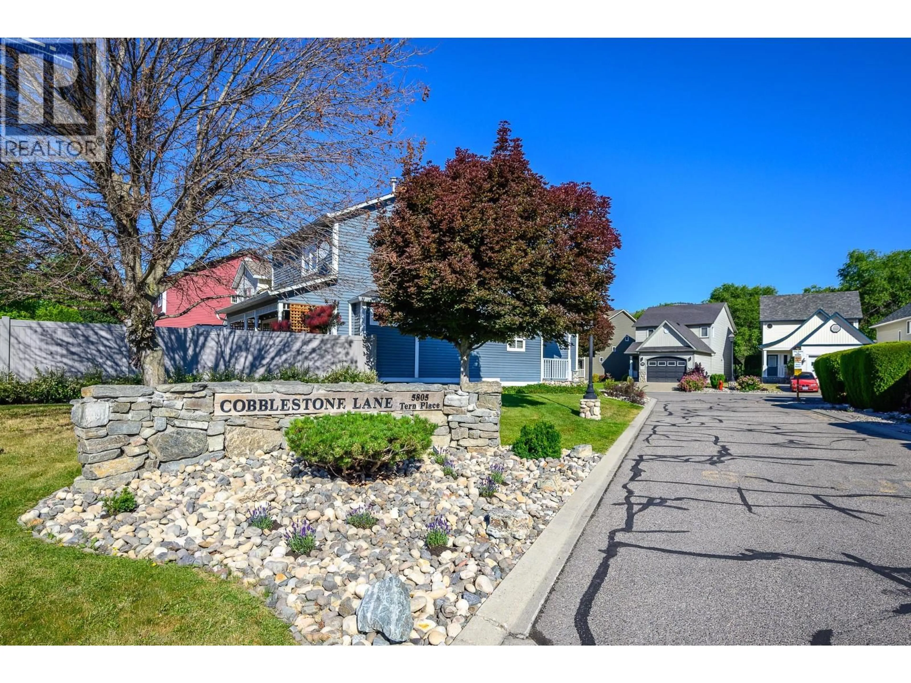 A pic from outside/outdoor area/front of a property/back of a property/a pic from drone, street for 113 - 5805 TERN PLACE, Vernon British Columbia V1H1S8