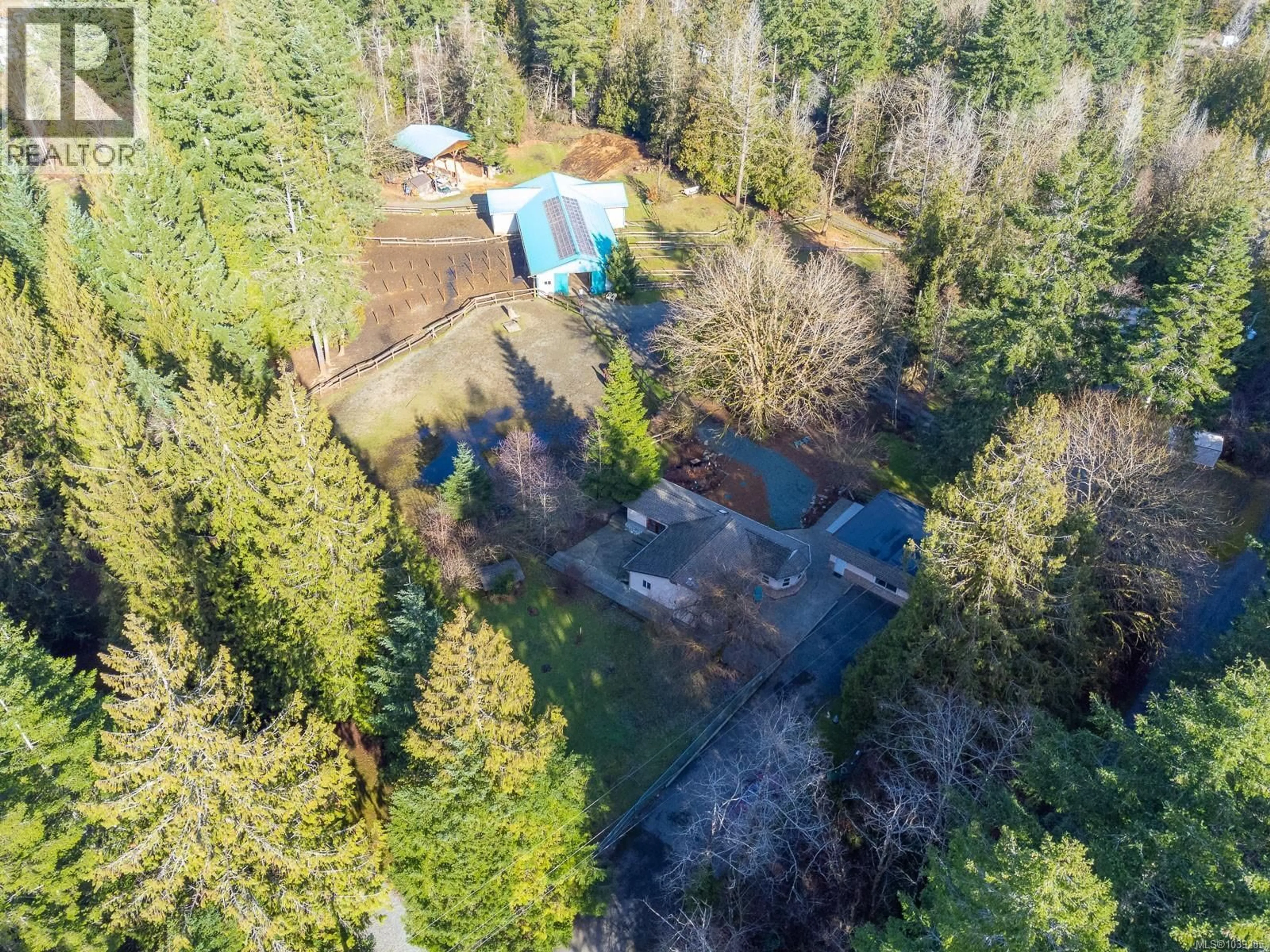 A pic from outside/outdoor area/front of a property/back of a property/a pic from drone, forest/trees view for 4391 BEST ROAD, Port Alberni British Columbia V9Y8T8