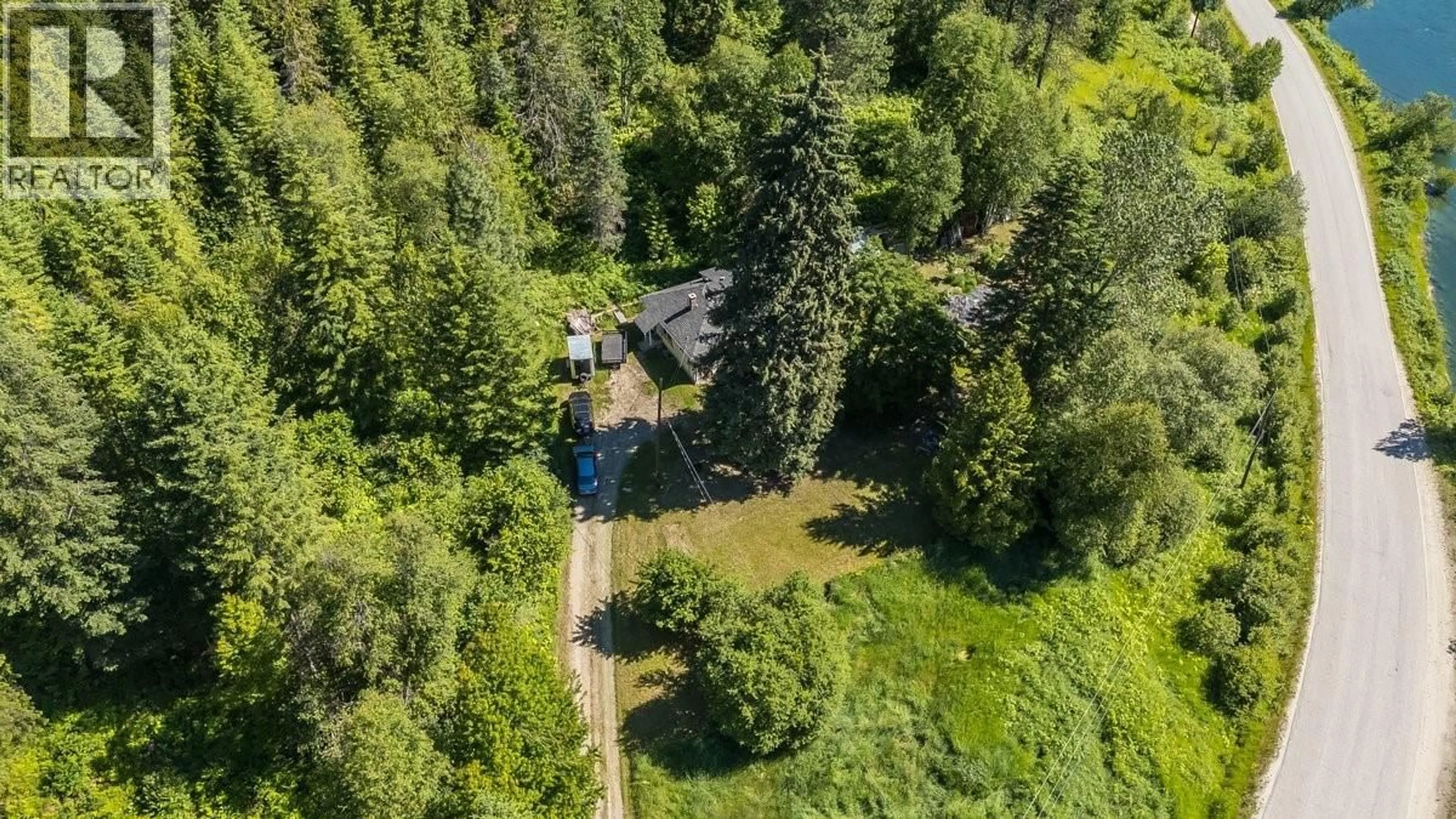 A pic from outside/outdoor area/front of a property/back of a property/a pic from drone, forest/trees view for 5875 SLOCAN RIVER ROAD, Winlaw British Columbia V0G2J0