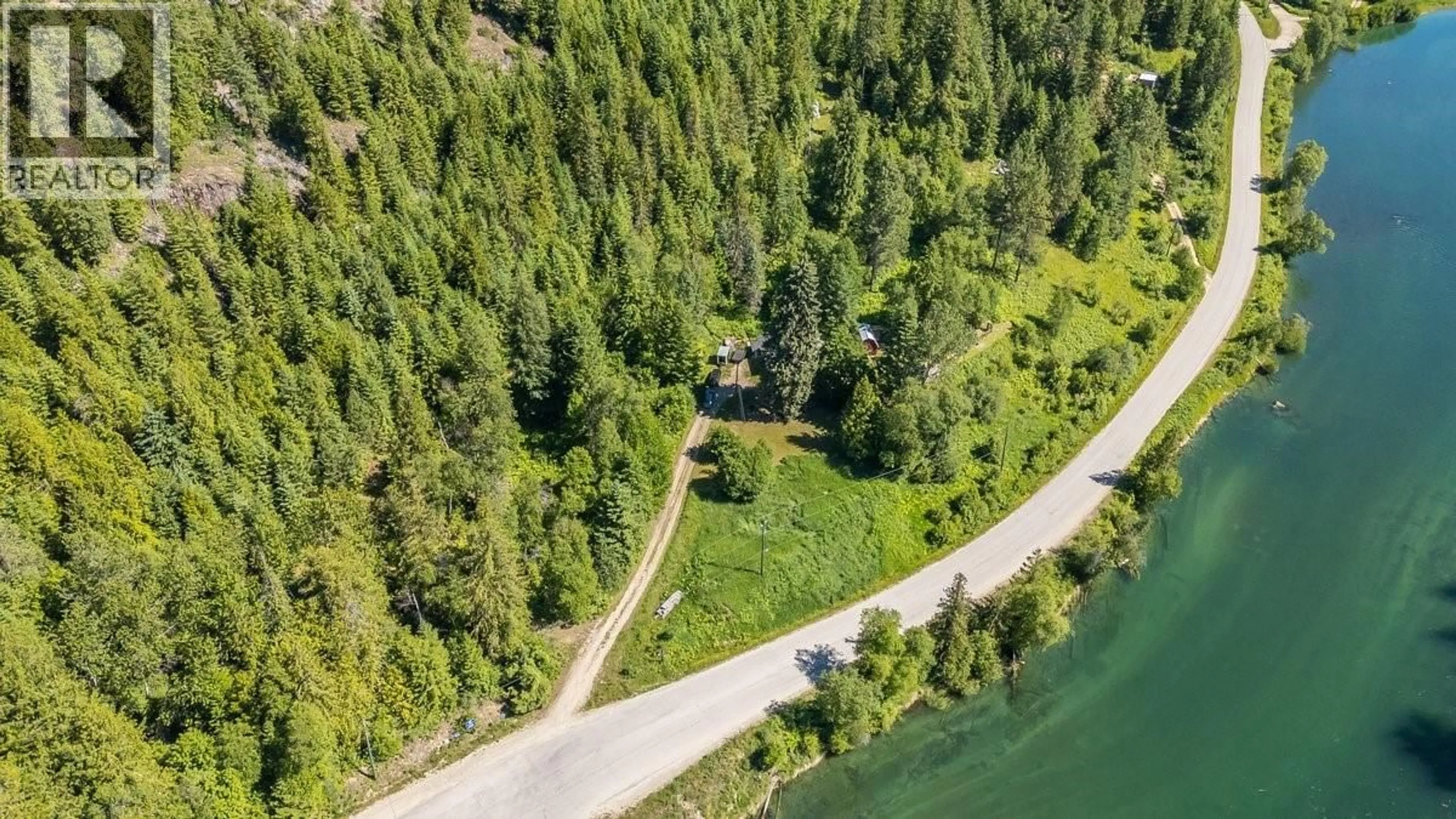 A pic from outside/outdoor area/front of a property/back of a property/a pic from drone, water/lake/river/ocean view for 5875 SLOCAN RIVER ROAD, Winlaw British Columbia V0G2J0