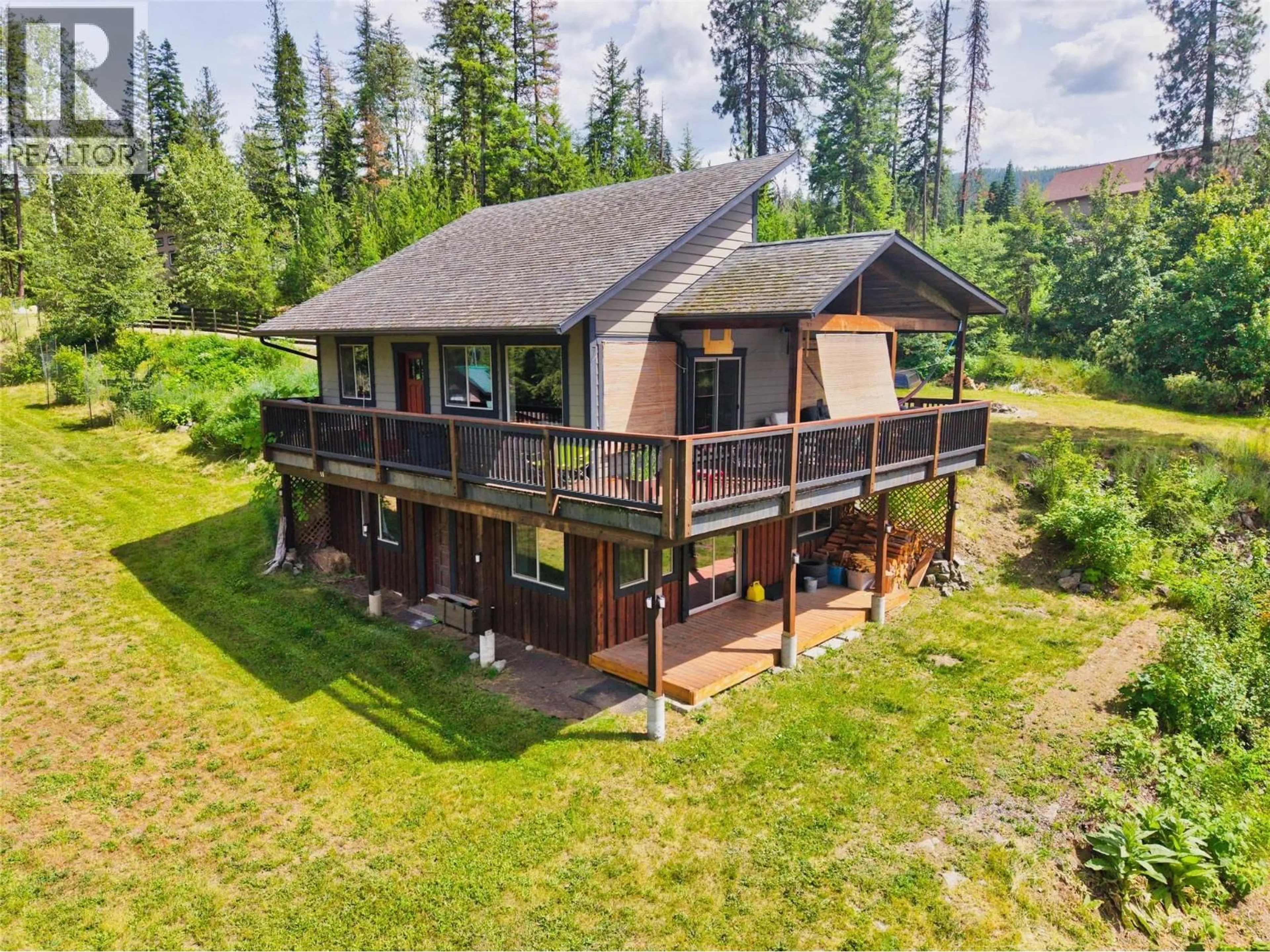 A pic from outside/outdoor area/front of a property/back of a property/a pic from drone, unknown for 4602 CARLSON EAST ROAD, Nelson British Columbia V1L6X3