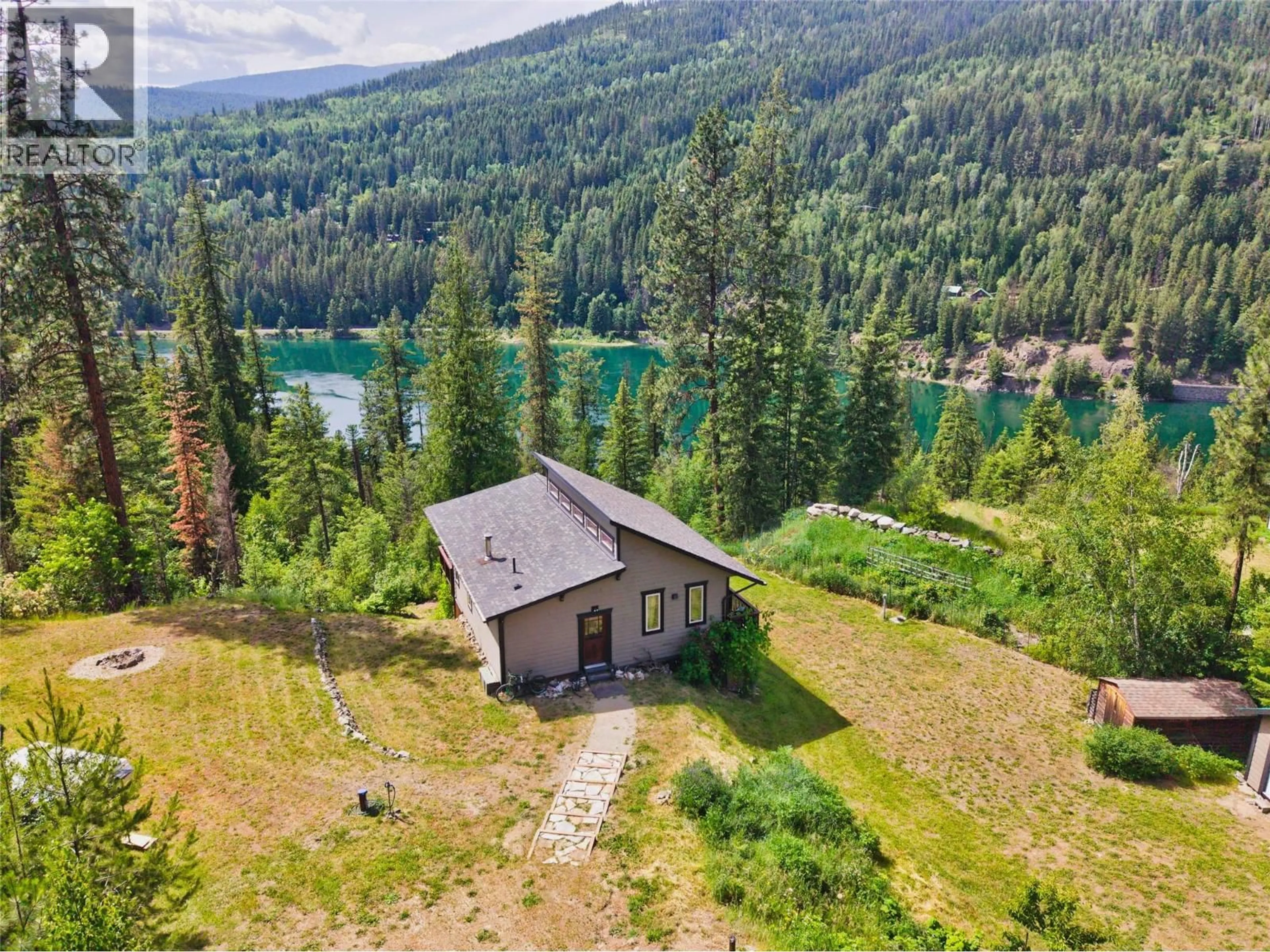A pic from outside/outdoor area/front of a property/back of a property/a pic from drone, water/lake/river/ocean view for 4602 CARLSON EAST ROAD, Nelson British Columbia V1L6X3