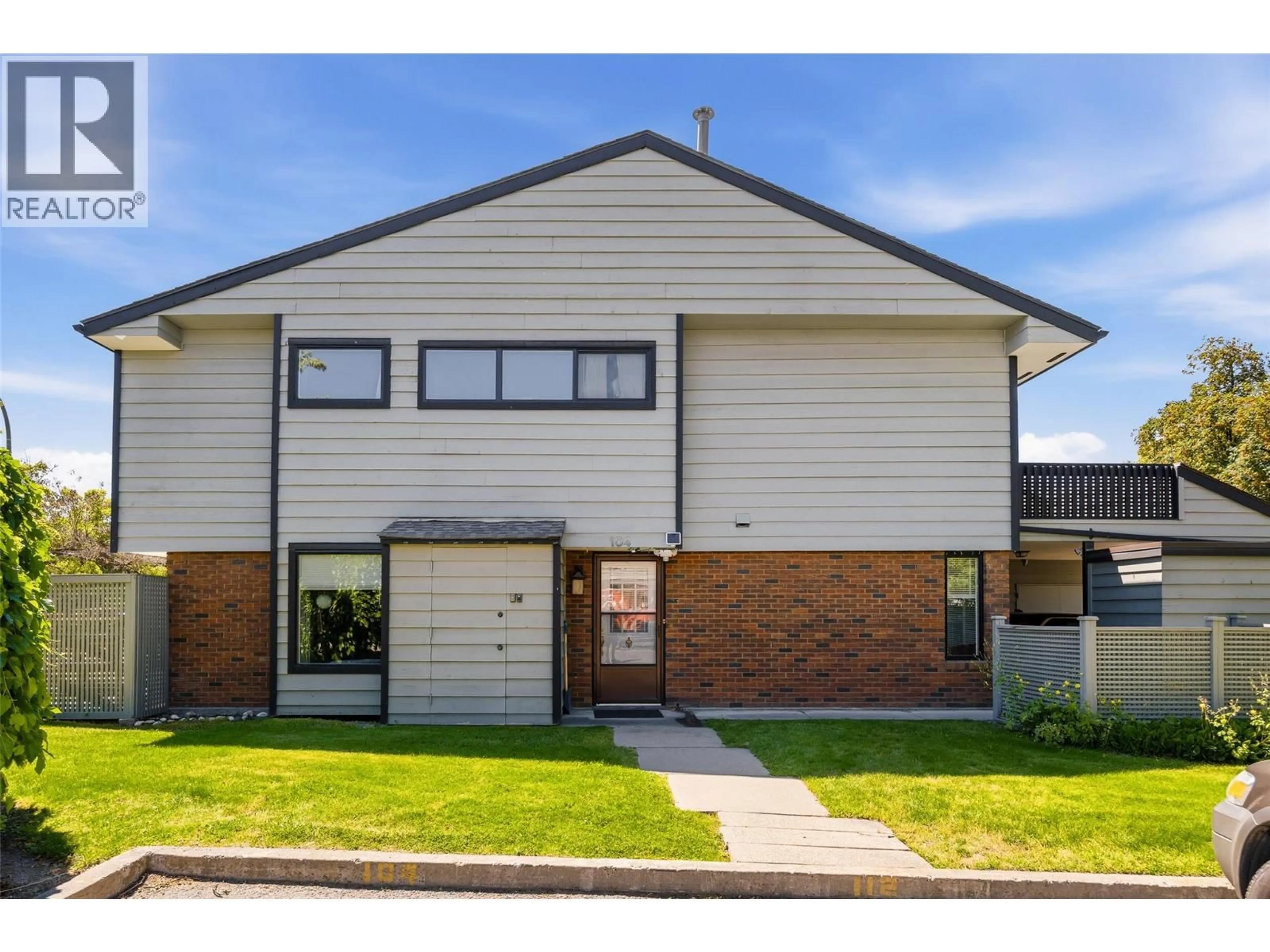Home with brick exterior material, street for 104 - 1050 SPRINGFIELD ROAD, Kelowna British Columbia V1Y8J7