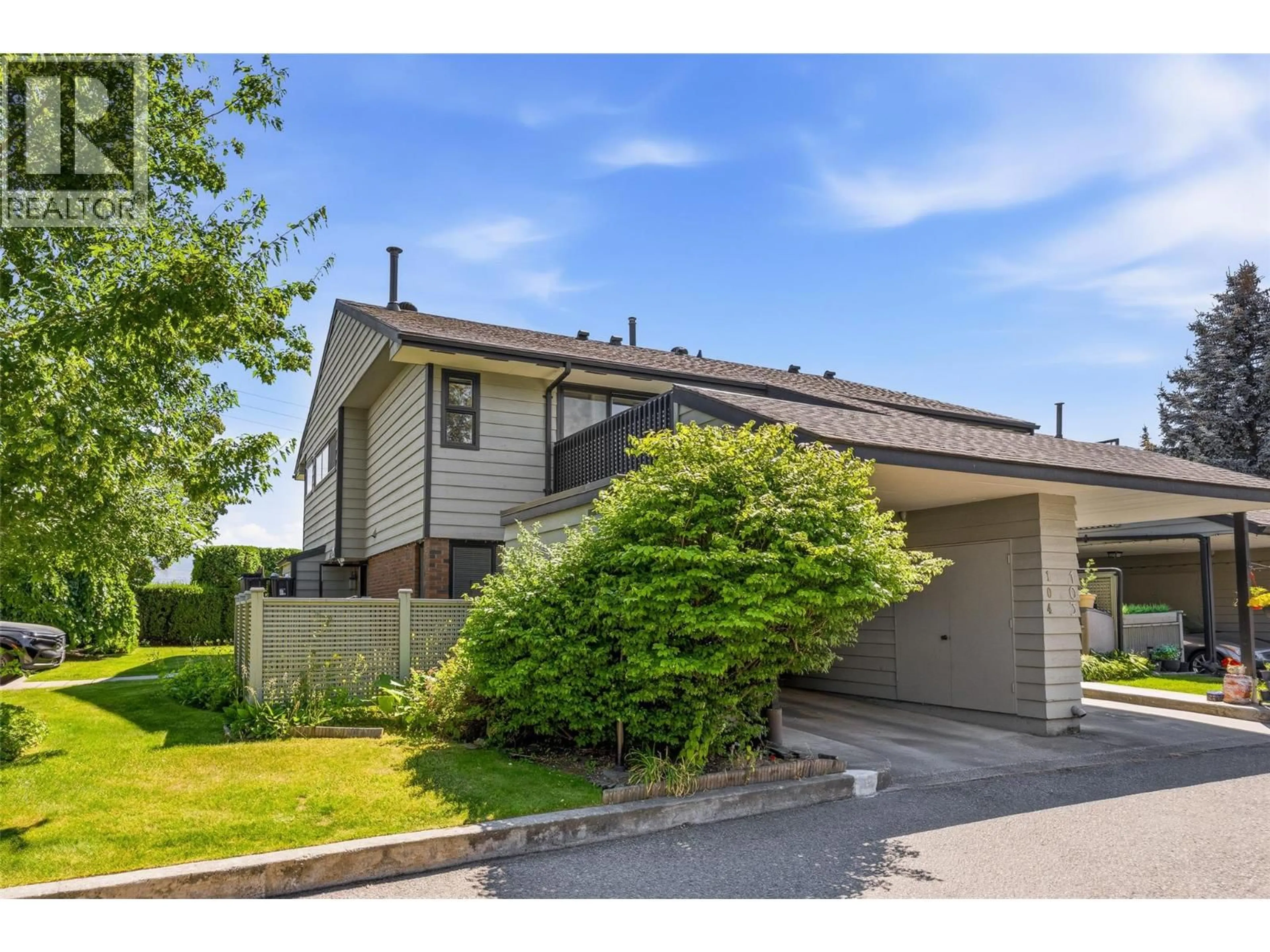 A pic from outside/outdoor area/front of a property/back of a property/a pic from drone, street for 104 - 1050 SPRINGFIELD ROAD, Kelowna British Columbia V1Y8J7