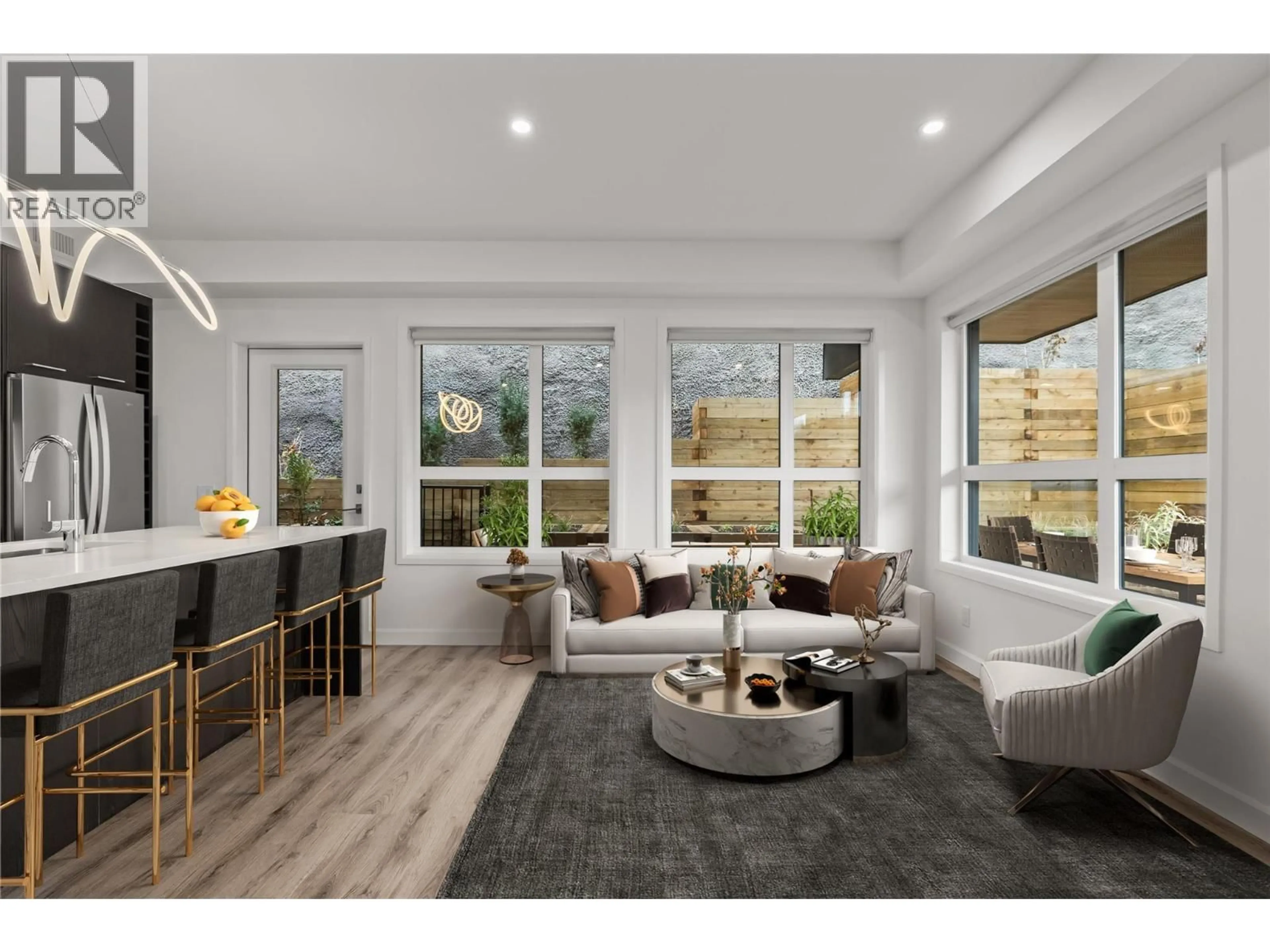 Living room with furniture, wood/laminate floor for 325 - 630 BOYNTON PLACE, Kelowna British Columbia V1V3B8