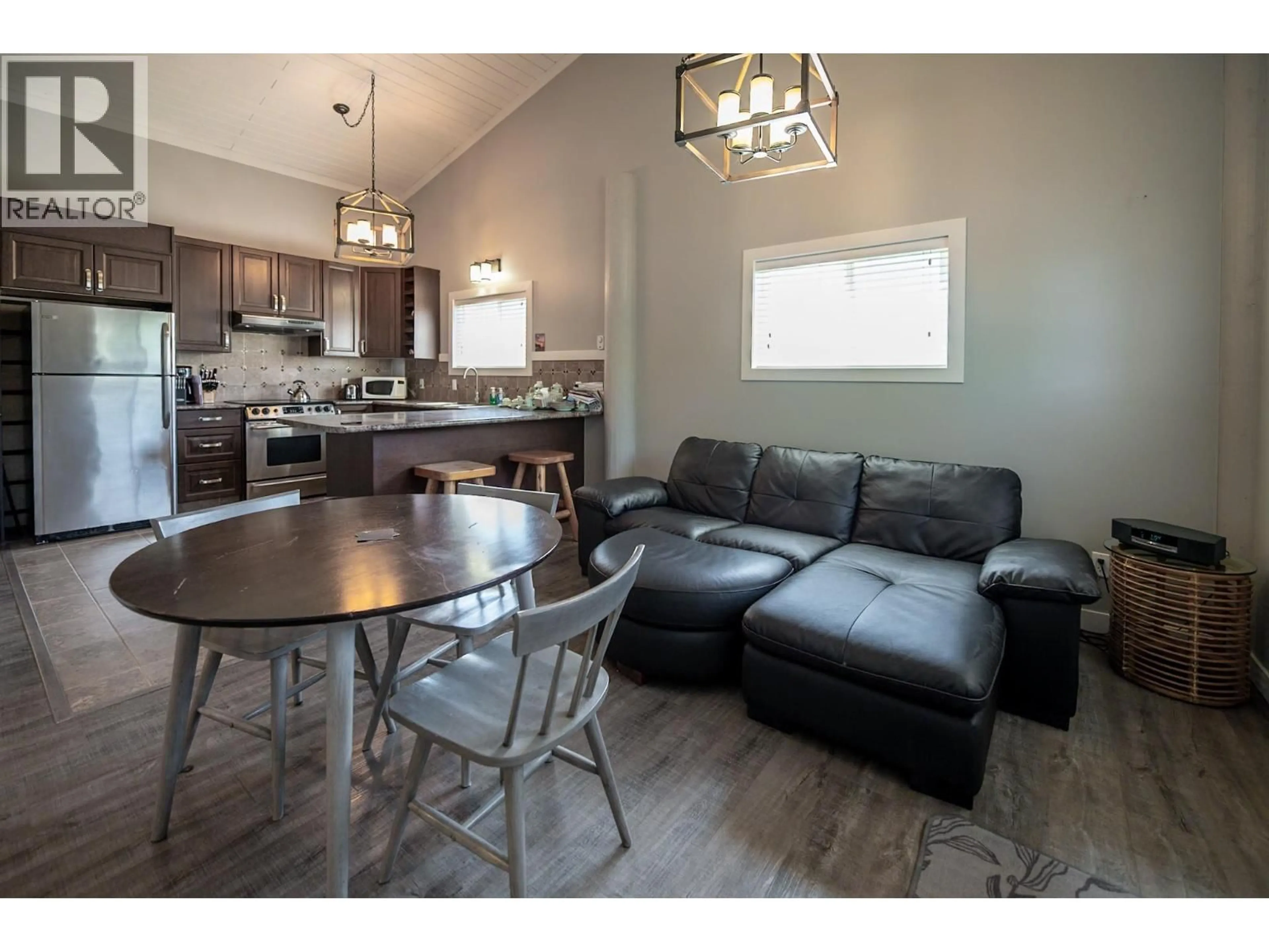 Open concept kitchen, wood/laminate floor for 8898 GRAINGER ROAD, Canal Flats British Columbia V0B1B0