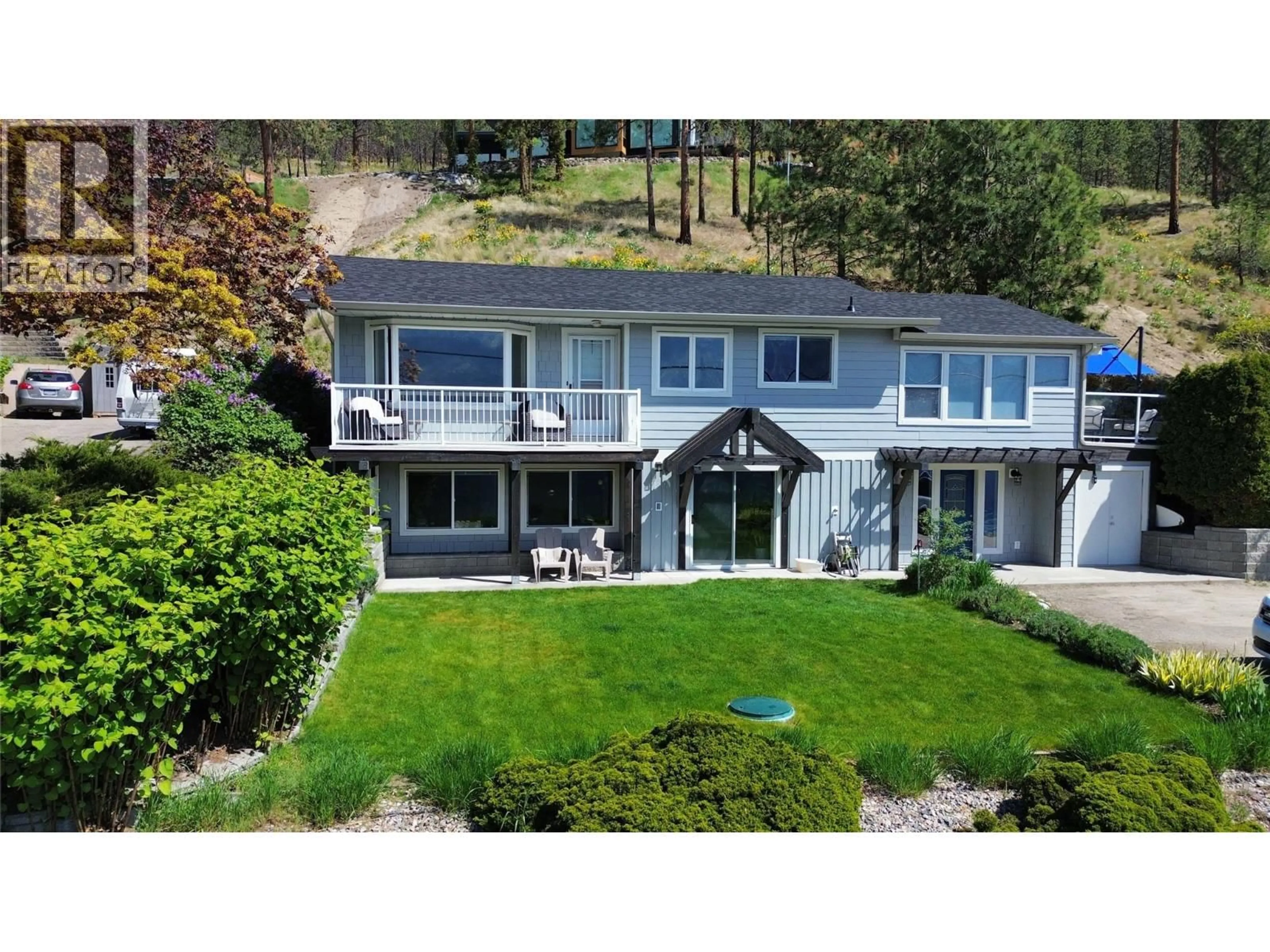 A pic from outside/outdoor area/front of a property/back of a property/a pic from drone, unknown for 10837 OKANAGAN CENTRE ROAD WEST, Lake Country British Columbia V4V2H8