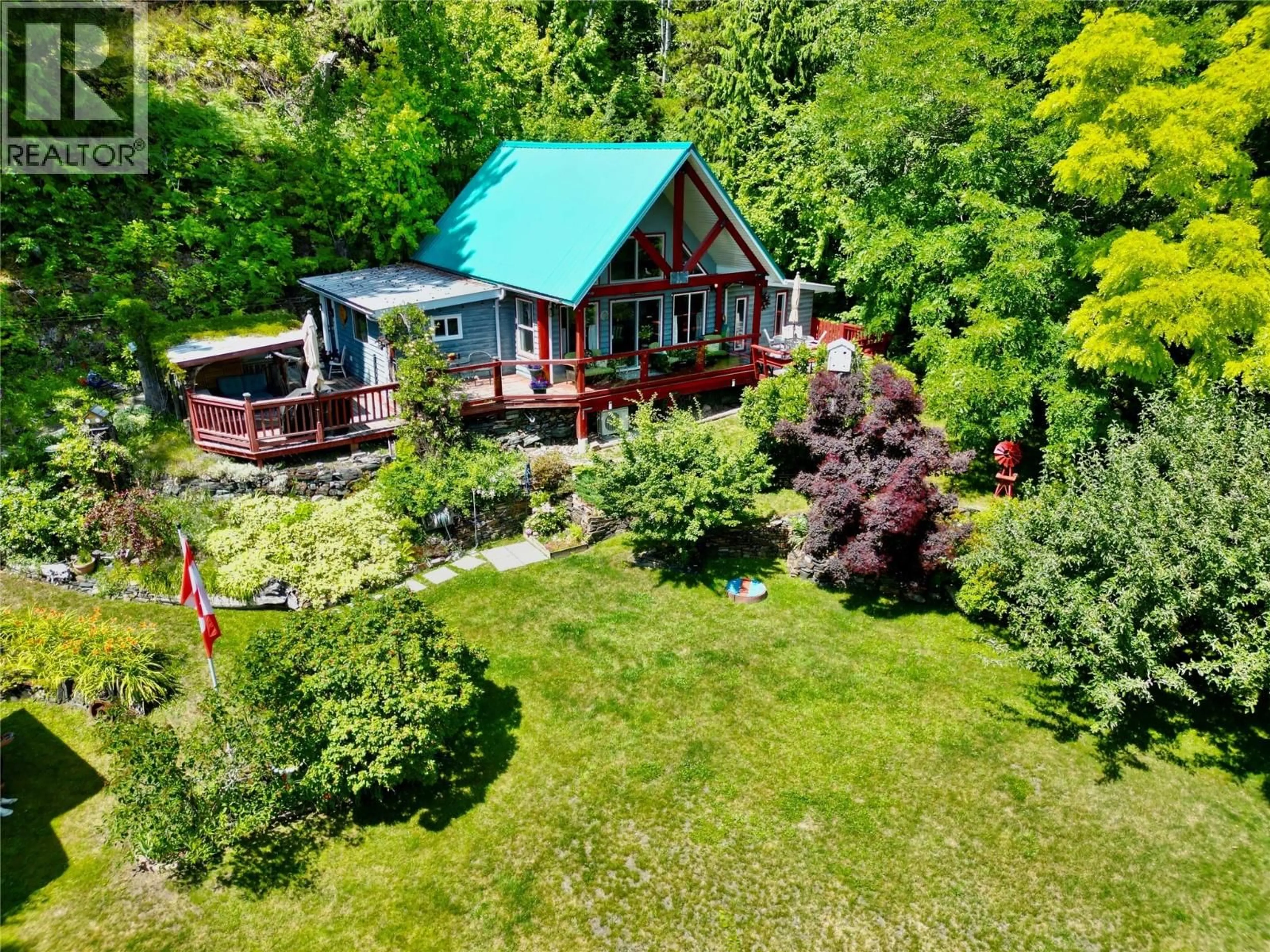 A pic from outside/outdoor area/front of a property/back of a property/a pic from drone, water/lake/river/ocean view for 5529 HIGHWAY 31 OTHER, Mirror Lake British Columbia V0G1M0