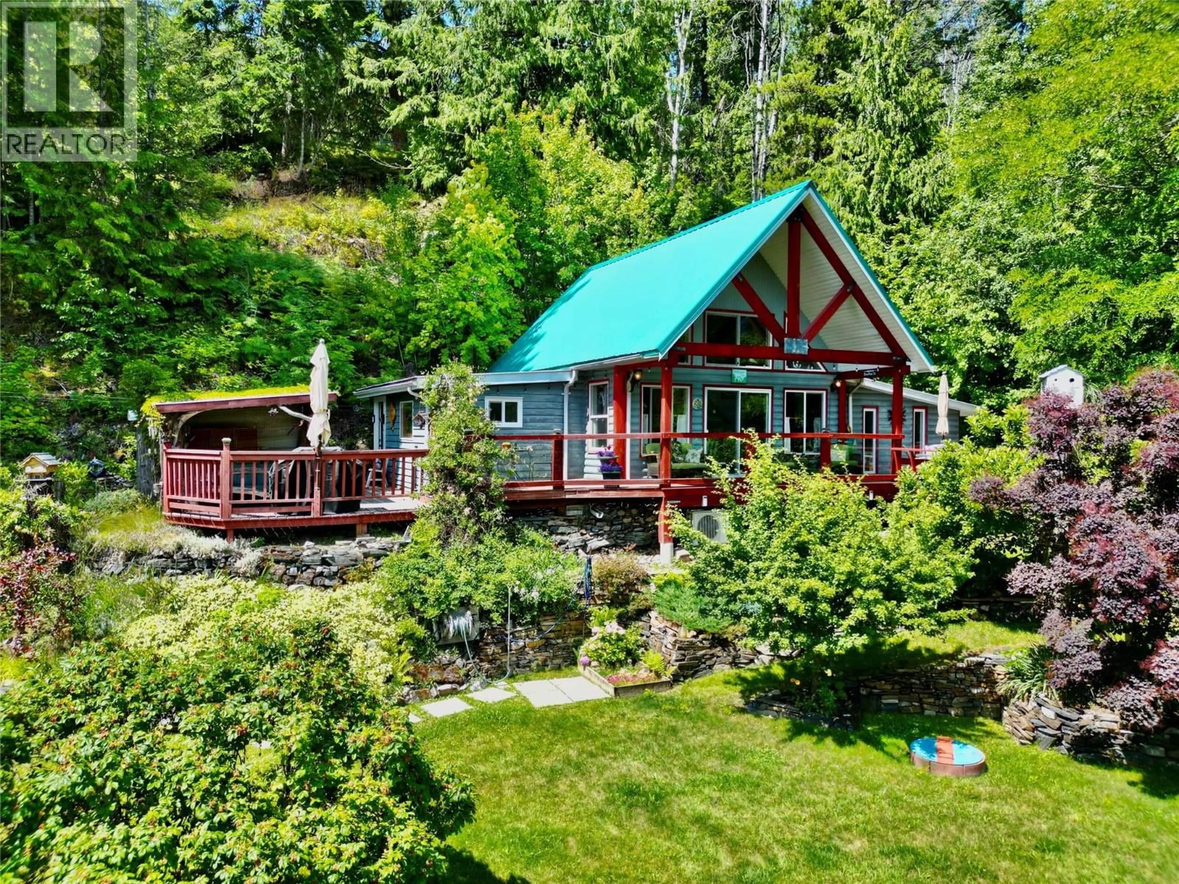 A pic from outside/outdoor area/front of a property/back of a property/a pic from drone, water/lake/river/ocean view for 5529 HIGHWAY 31 OTHER, Mirror Lake British Columbia V0G1M0