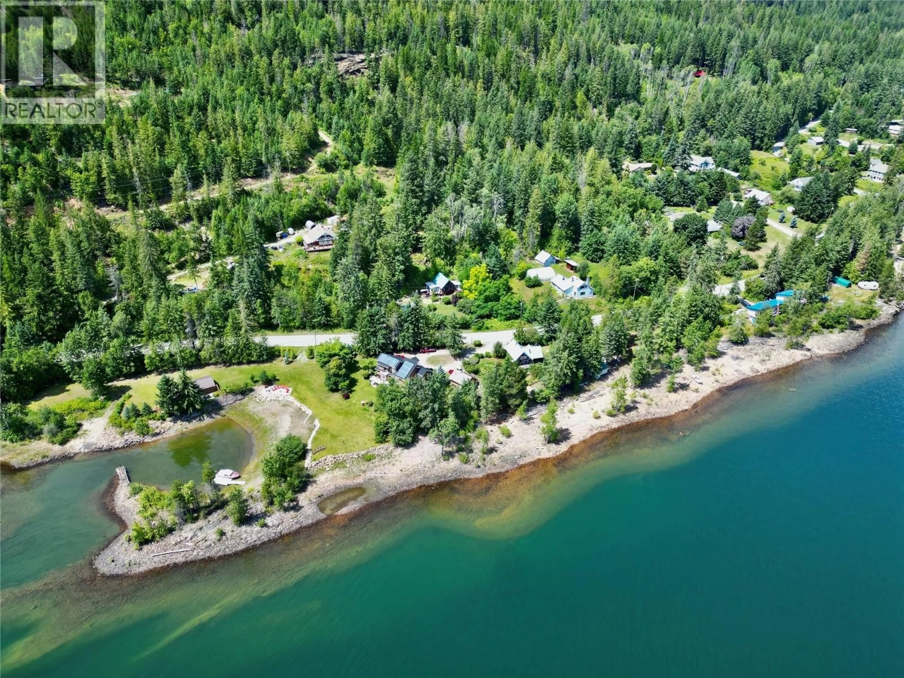 A pic from outside/outdoor area/front of a property/back of a property/a pic from drone, water/lake/river/ocean view for 5529 HIGHWAY 31 OTHER, Mirror Lake British Columbia V0G1M0