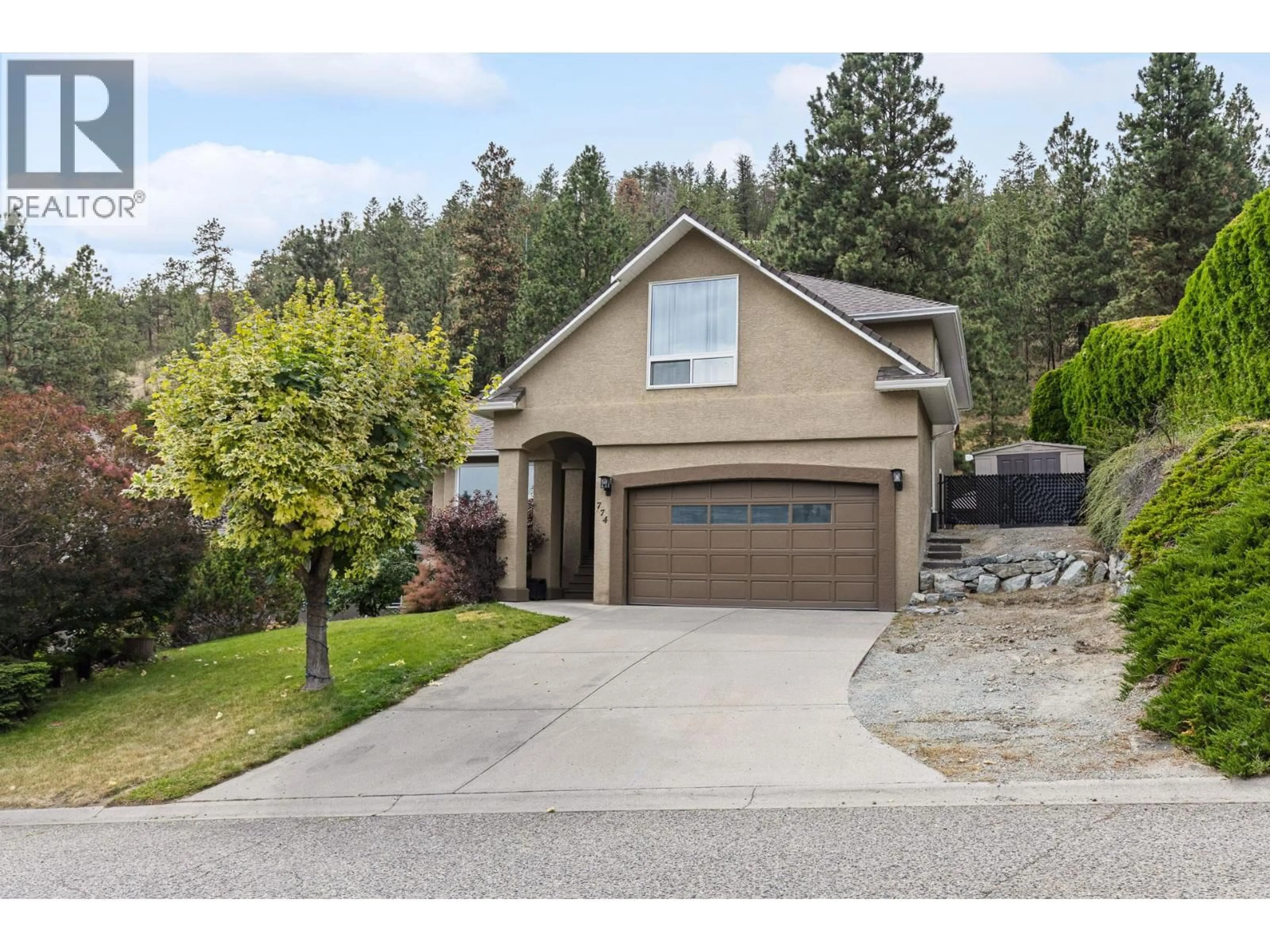 Home with vinyl exterior material, street for 774 NAHANNI PLACE, Kelowna British Columbia V1V1N5