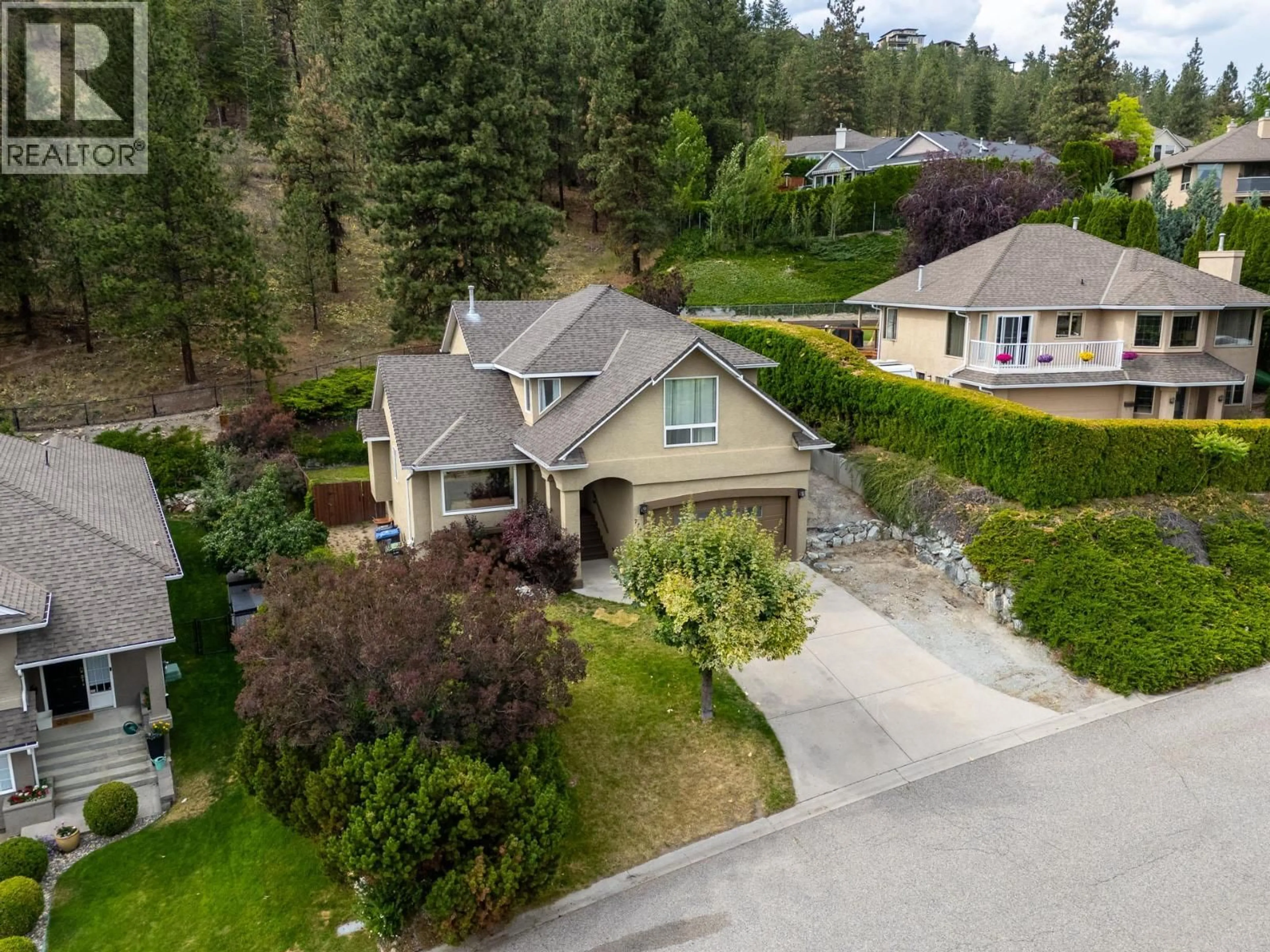 A pic from outside/outdoor area/front of a property/back of a property/a pic from drone, street for 774 NAHANNI PLACE, Kelowna British Columbia V1V1N5