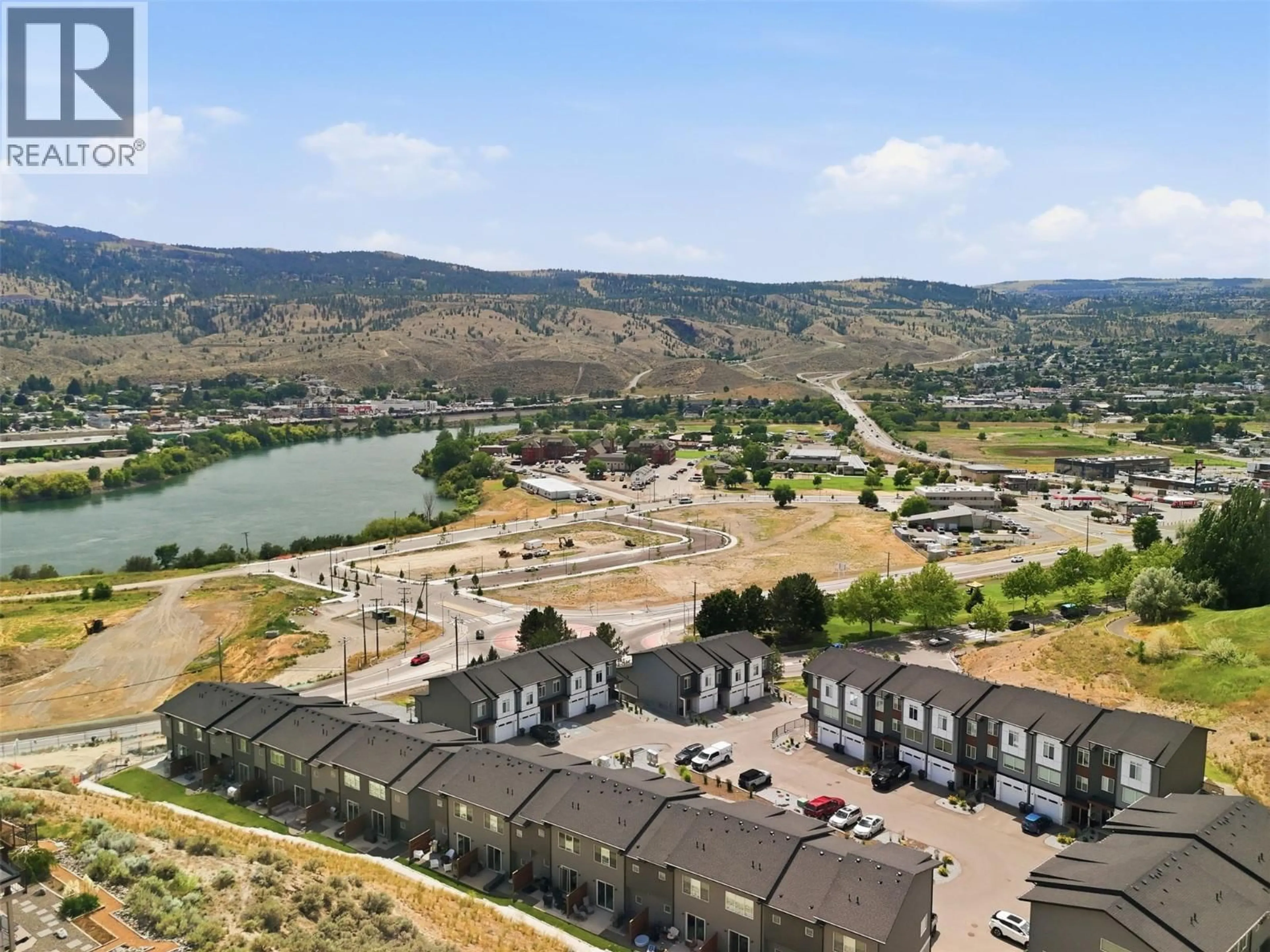 A pic from outside/outdoor area/front of a property/back of a property/a pic from drone, water/lake/river/ocean view for 115 RIVER GATE DRIVE, Kamloops British Columbia V2H0E4