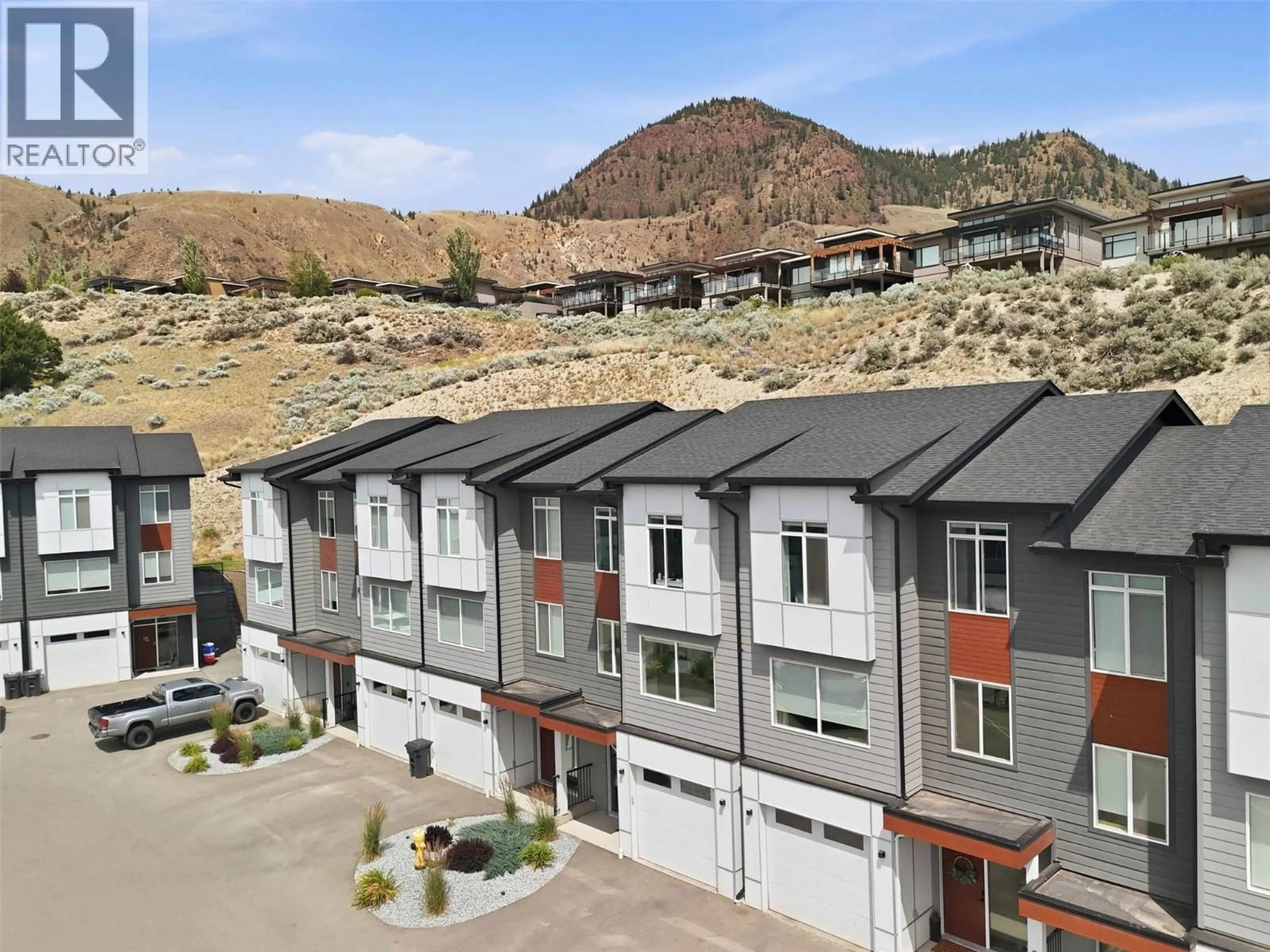 A pic from outside/outdoor area/front of a property/back of a property/a pic from drone, mountain view for 115 RIVER GATE DRIVE, Kamloops British Columbia V2H0E4