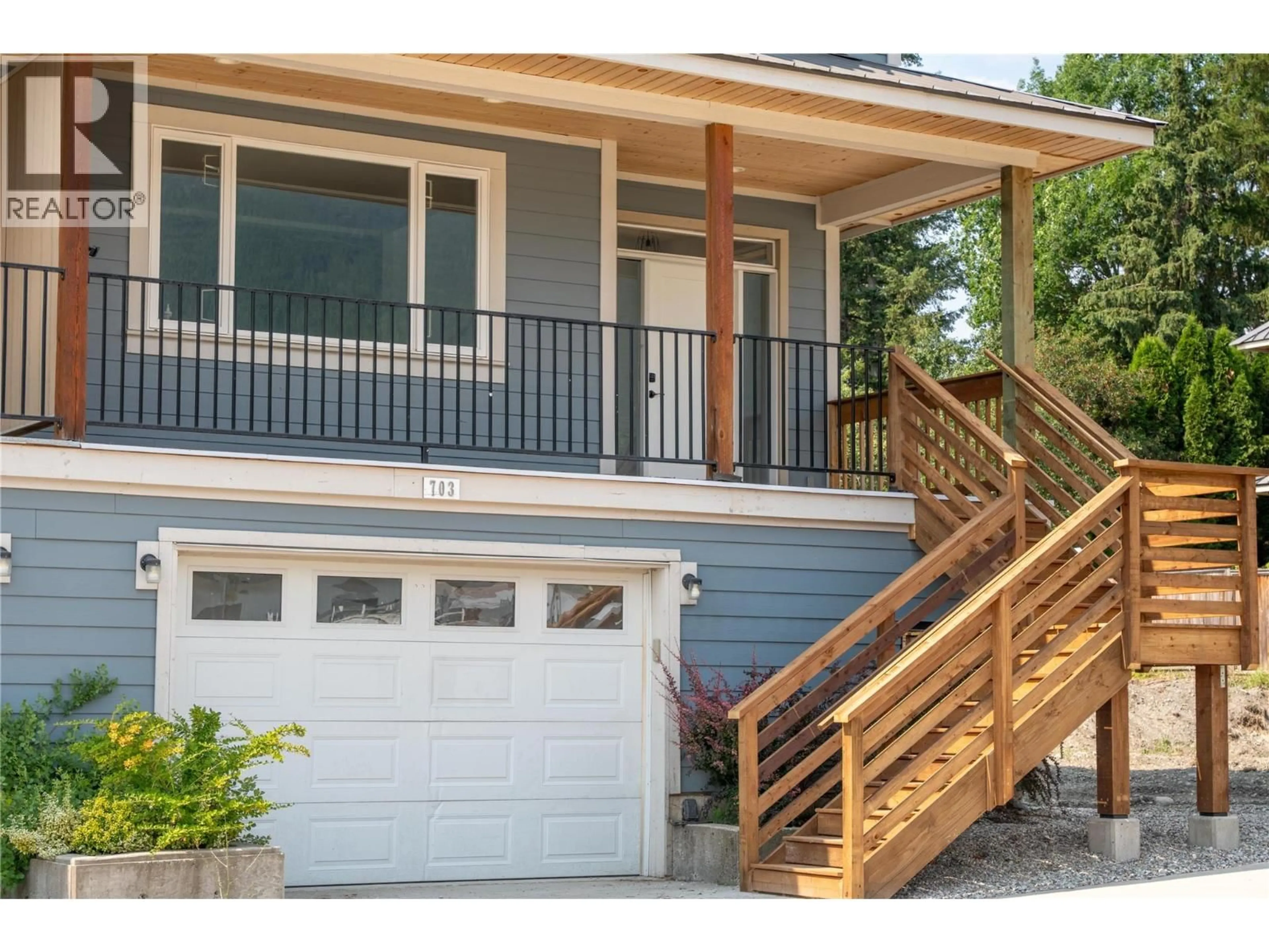 Home with vinyl exterior material, street for 703 CENTER STREET, Revelstoke British Columbia V0E2S0