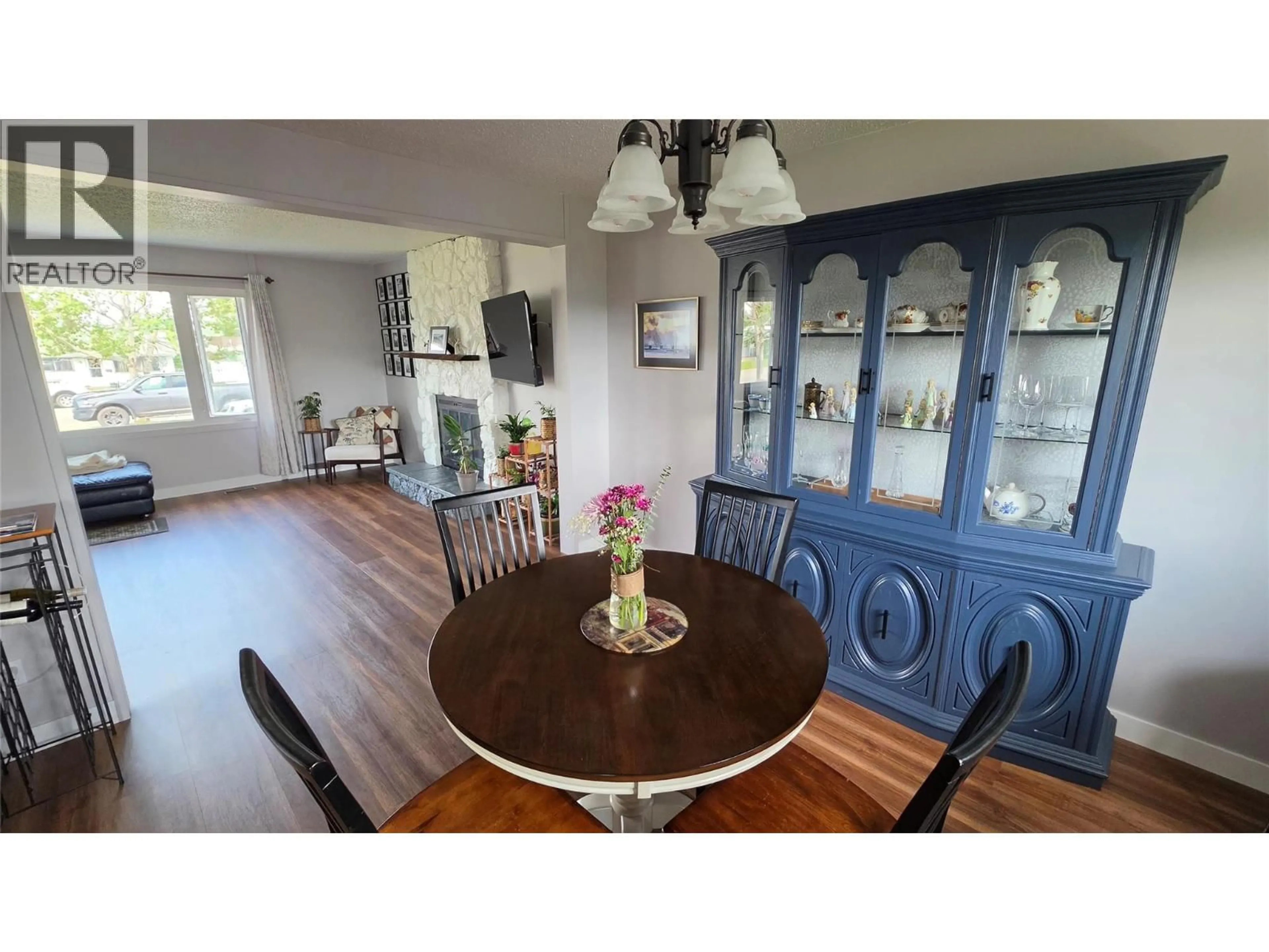 Dining room, wood/laminate floor for 1533 116 AVENUE, Dawson Creek British Columbia V1G2N8