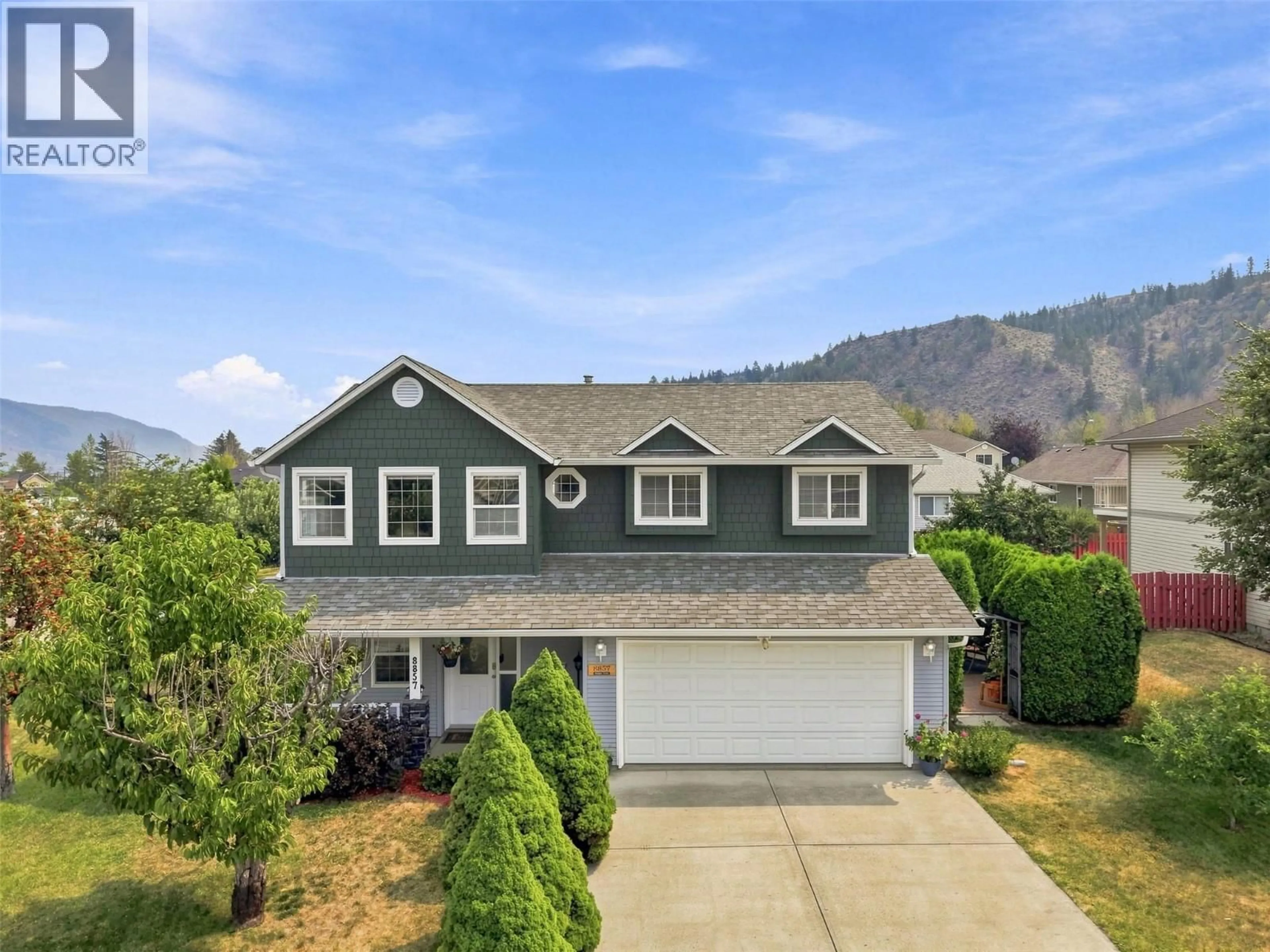 A pic from outside/outdoor area/front of a property/back of a property/a pic from drone, mountain view for 8857 BADGER DRIVE, Kamloops British Columbia V2C6V2