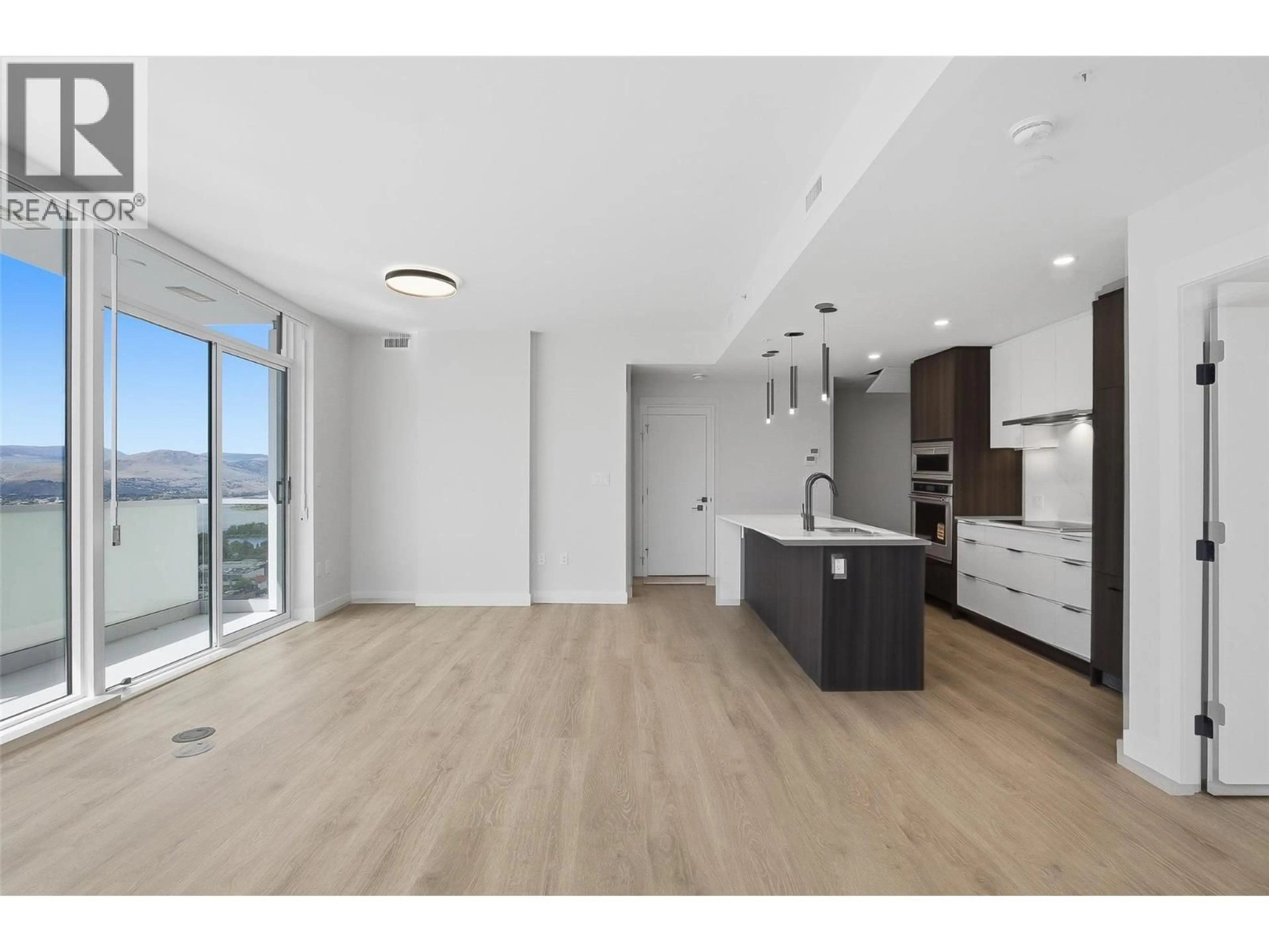 Open concept kitchen, wood/laminate floor for 1806 - 460 NICOLA STREET, Kamloops British Columbia V2C0N2