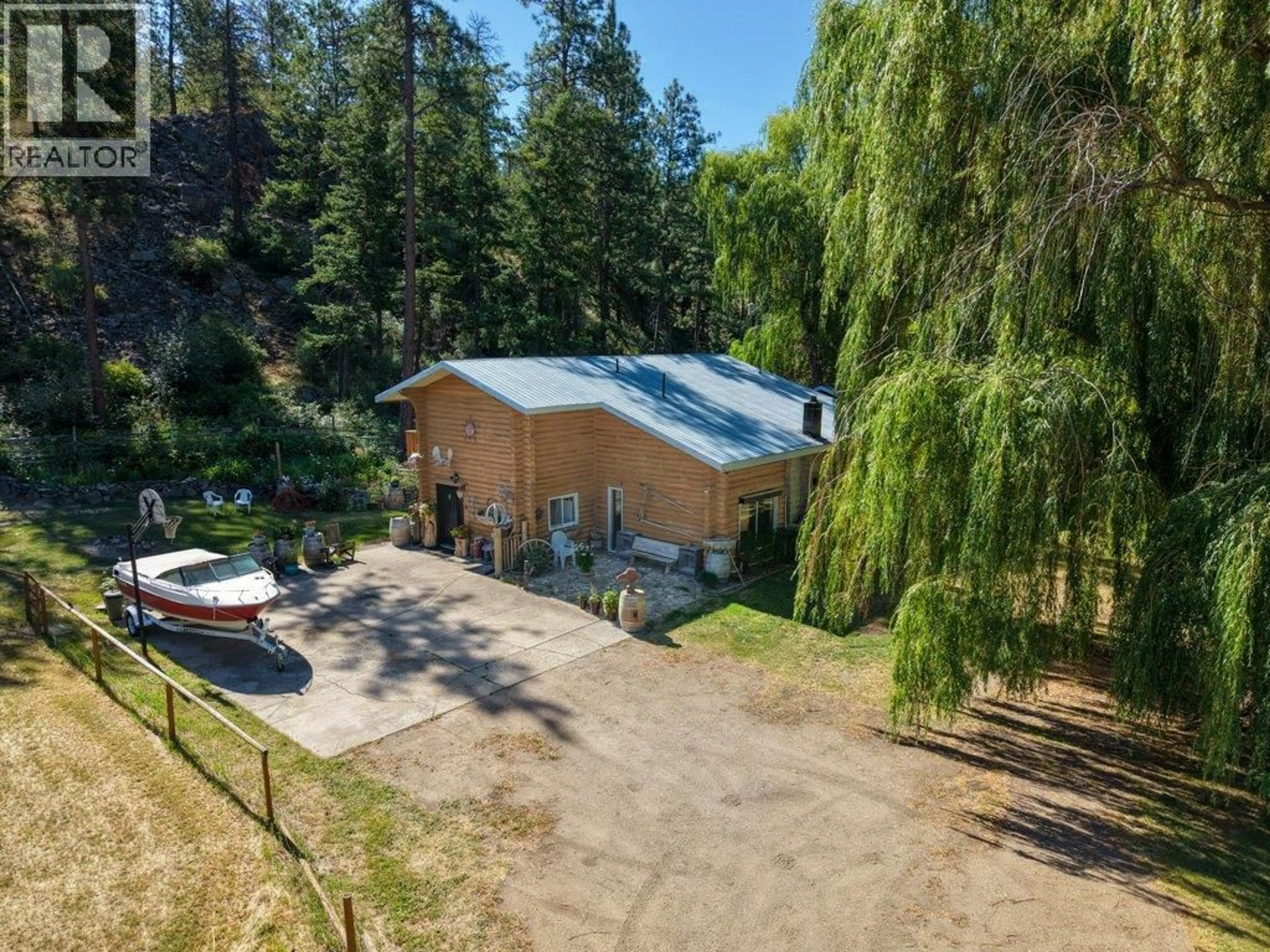 A pic from outside/outdoor area/front of a property/back of a property/a pic from drone, forest/trees view for 1876 WILLOWBROOK ROAD, Oliver British Columbia V0H1T0