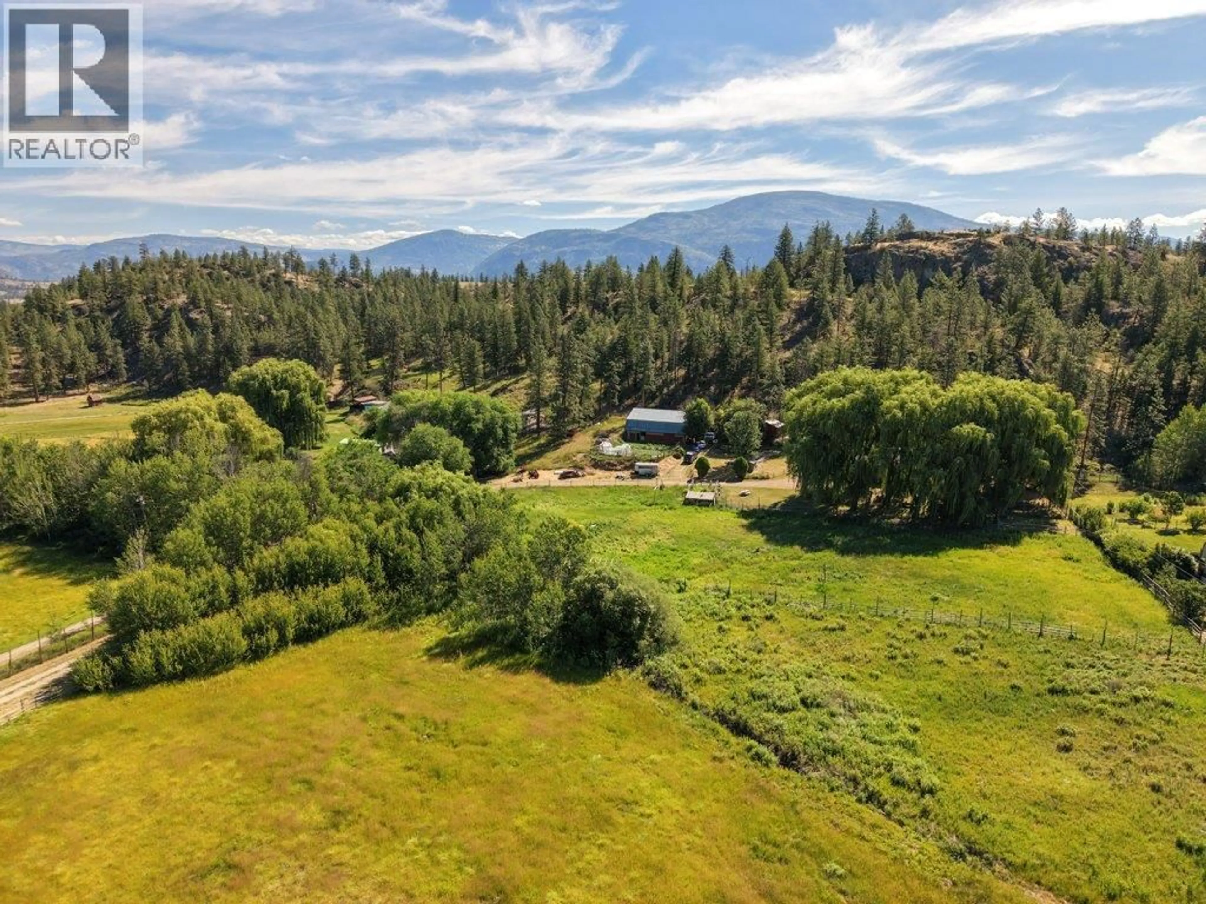 A pic from outside/outdoor area/front of a property/back of a property/a pic from drone, mountain view for 1876 WILLOWBROOK ROAD, Oliver British Columbia V0H1T0