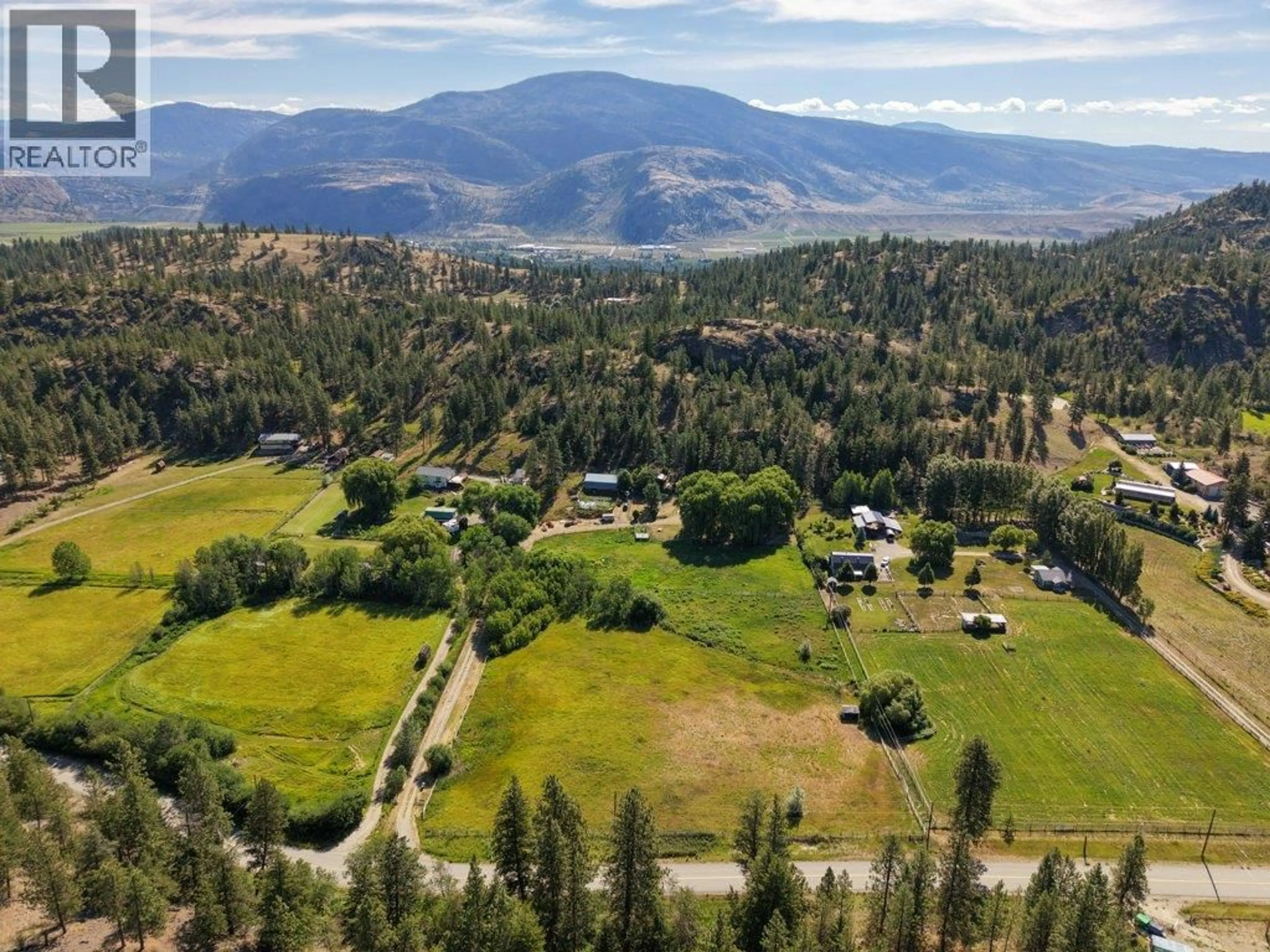 A pic from outside/outdoor area/front of a property/back of a property/a pic from drone, mountain view for 1876 WILLOWBROOK ROAD, Oliver British Columbia V0H1T0