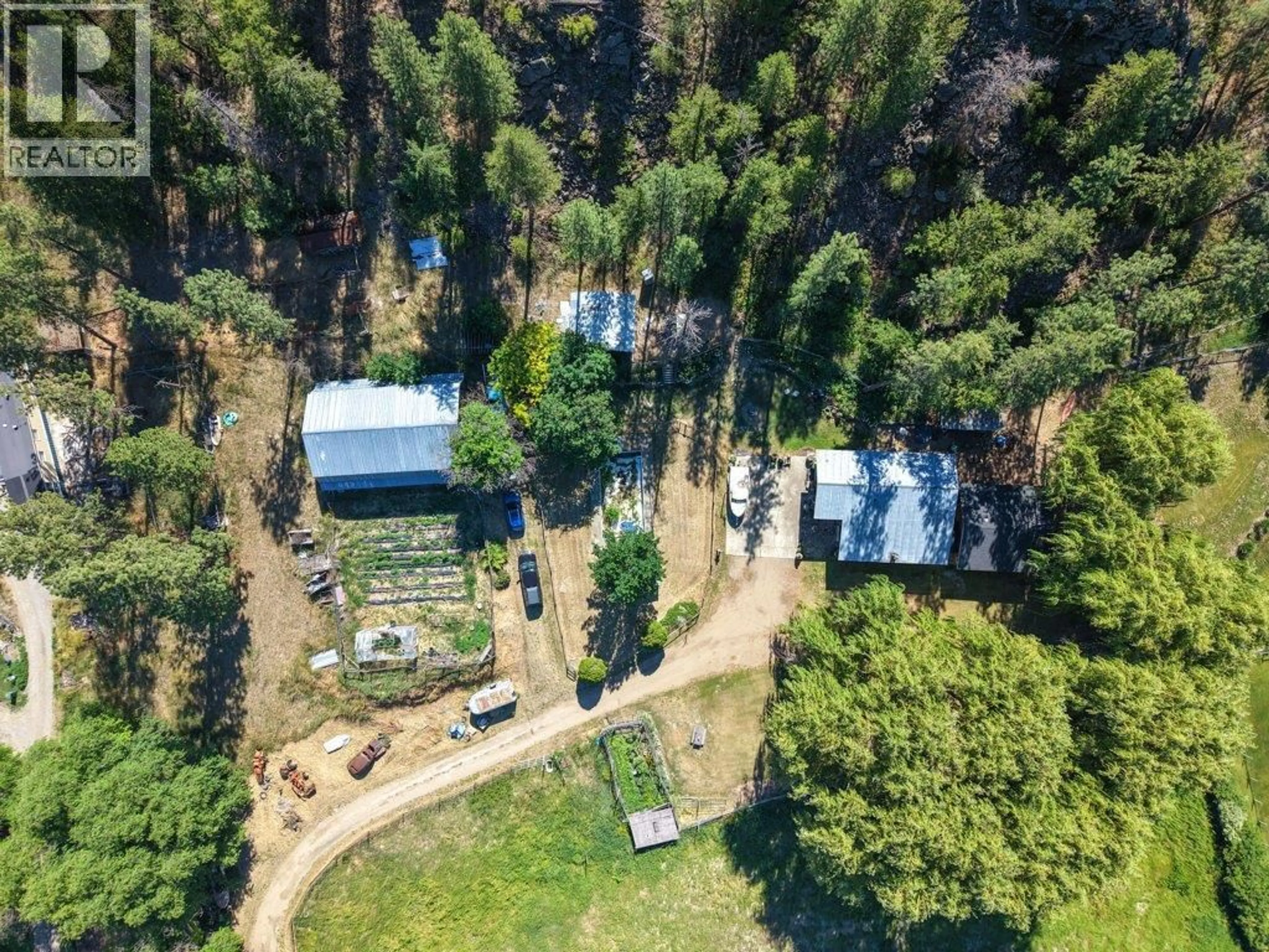 A pic from outside/outdoor area/front of a property/back of a property/a pic from drone, forest/trees view for 1876 WILLOWBROOK ROAD, Oliver British Columbia V0H1T0